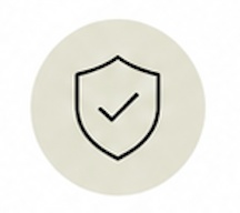 an icon of a shield with a tick inside