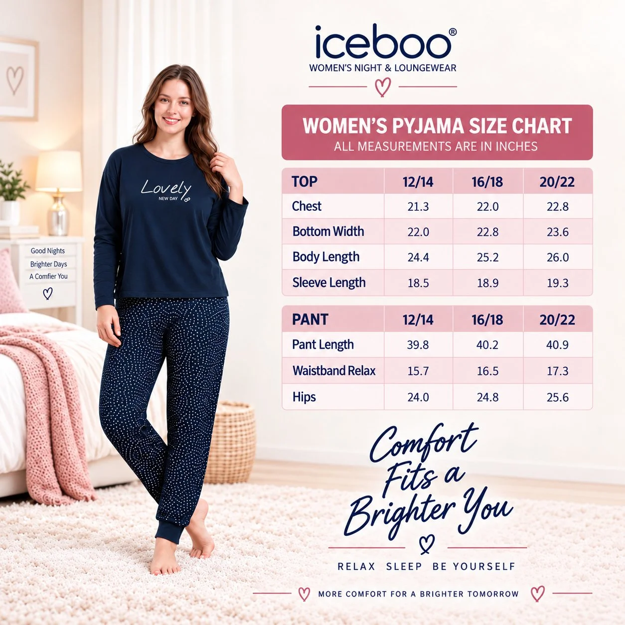 iceboo women's navy Lovely New Day pyjama set size chart showing top and trouser measurements in inches for UK sizes 12/14, 16/18 and 20/22, alongside a model wearing the star and heart print pyjamas.