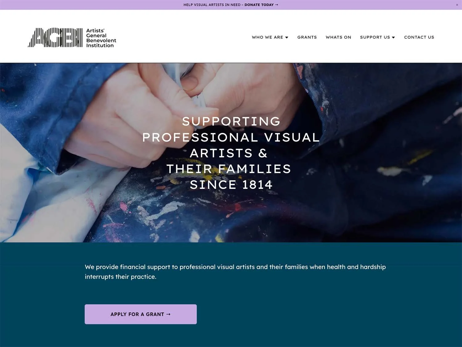 Website homepage of the Artists General Benevolent Institution (AGBI), supporting professional visual artists and their families since 1814. The background features a close-up of an artist’s hand holding a paintbrush, with splattered paint on their clothing.
