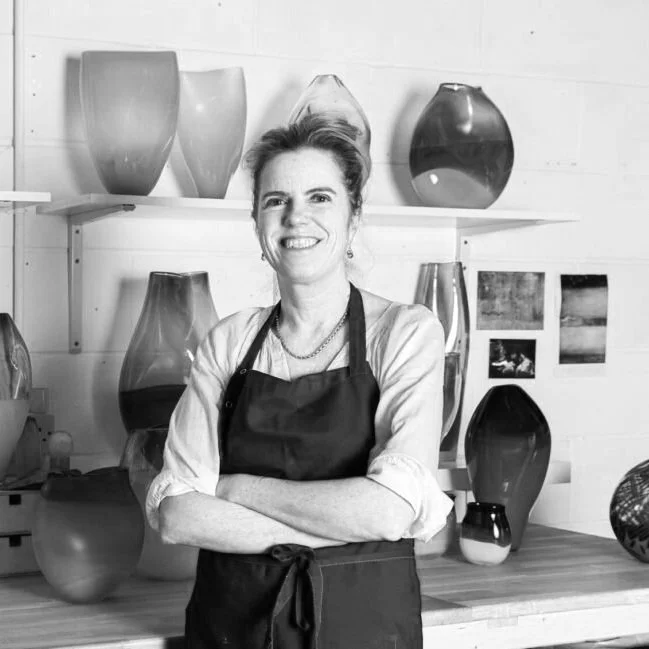 Portrait of Michele Oberdieck, glass & textile artist, sharing her experience with a professional artist website design.