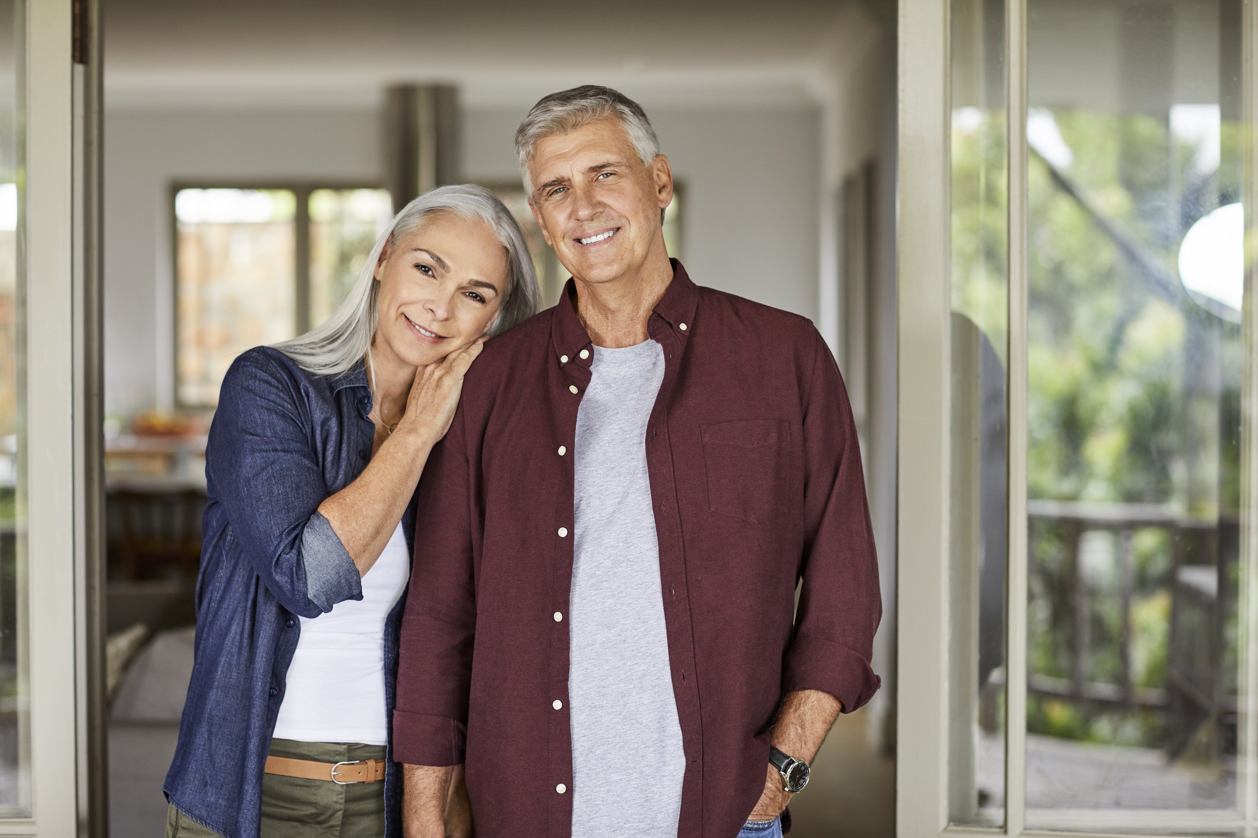 iStock-Retired couple standing in doorway_1344767684.jpg