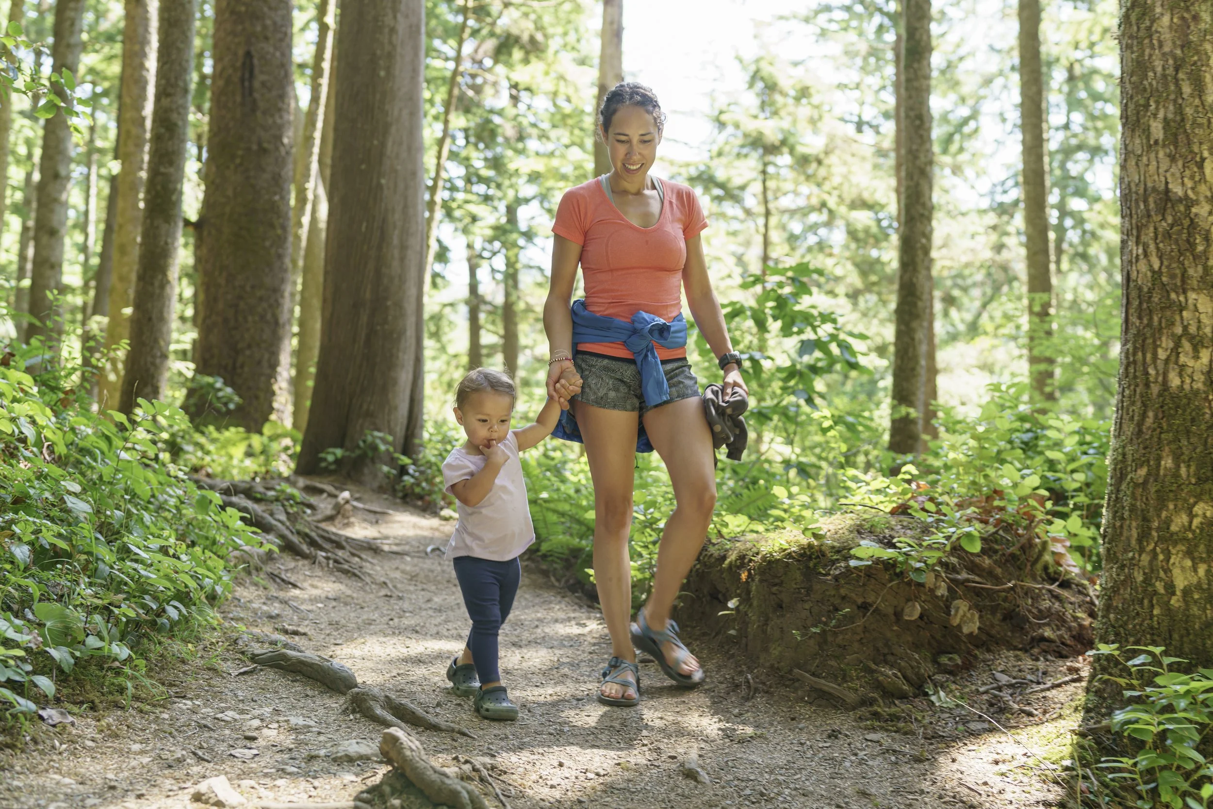 iStock-Mother walking her little girl thru PNW Forest_1343025026.jpg