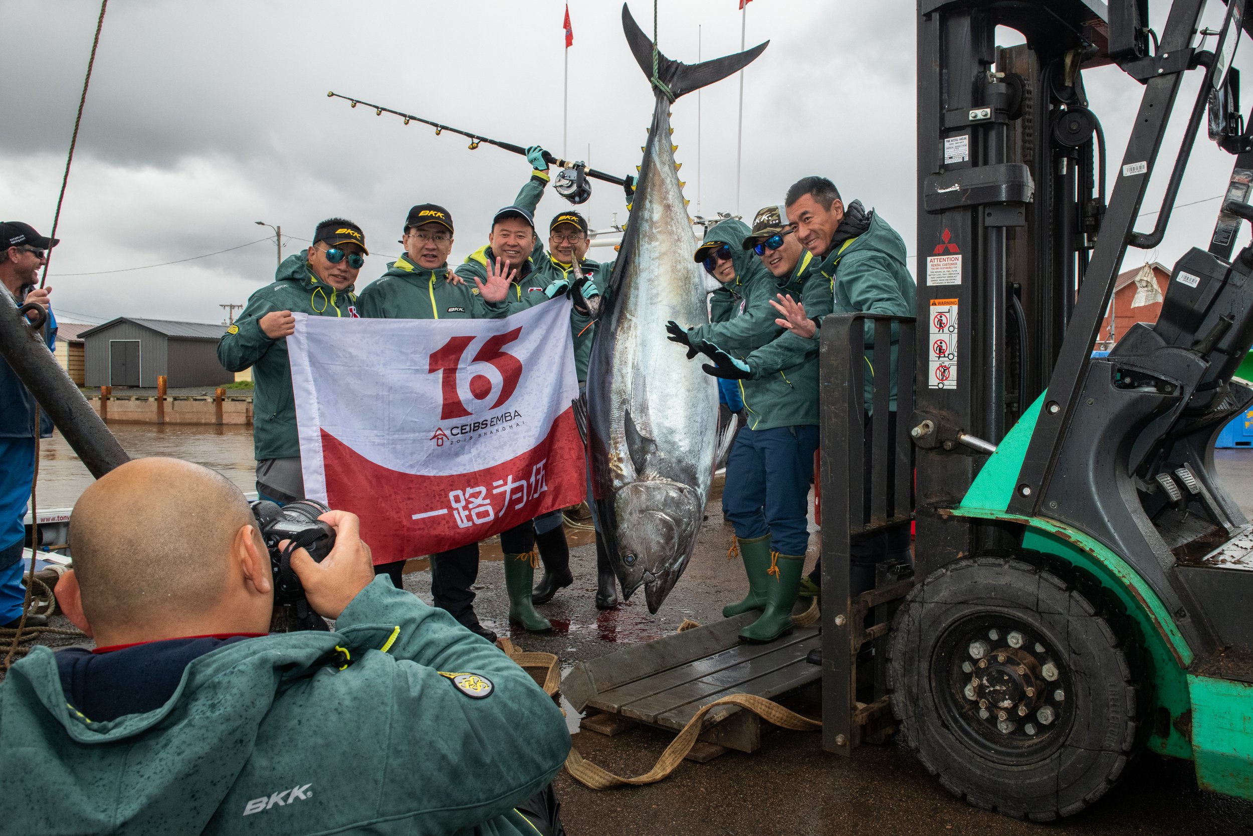 Sport fisherman pose with a giant bluefin tuna caught off Prince Edward Island, Canada. Overfishing has caused the decline of bluefin tuna throughout the world. The fishery in Atlantic Canada aims to strike a balance between commercial exploitation a