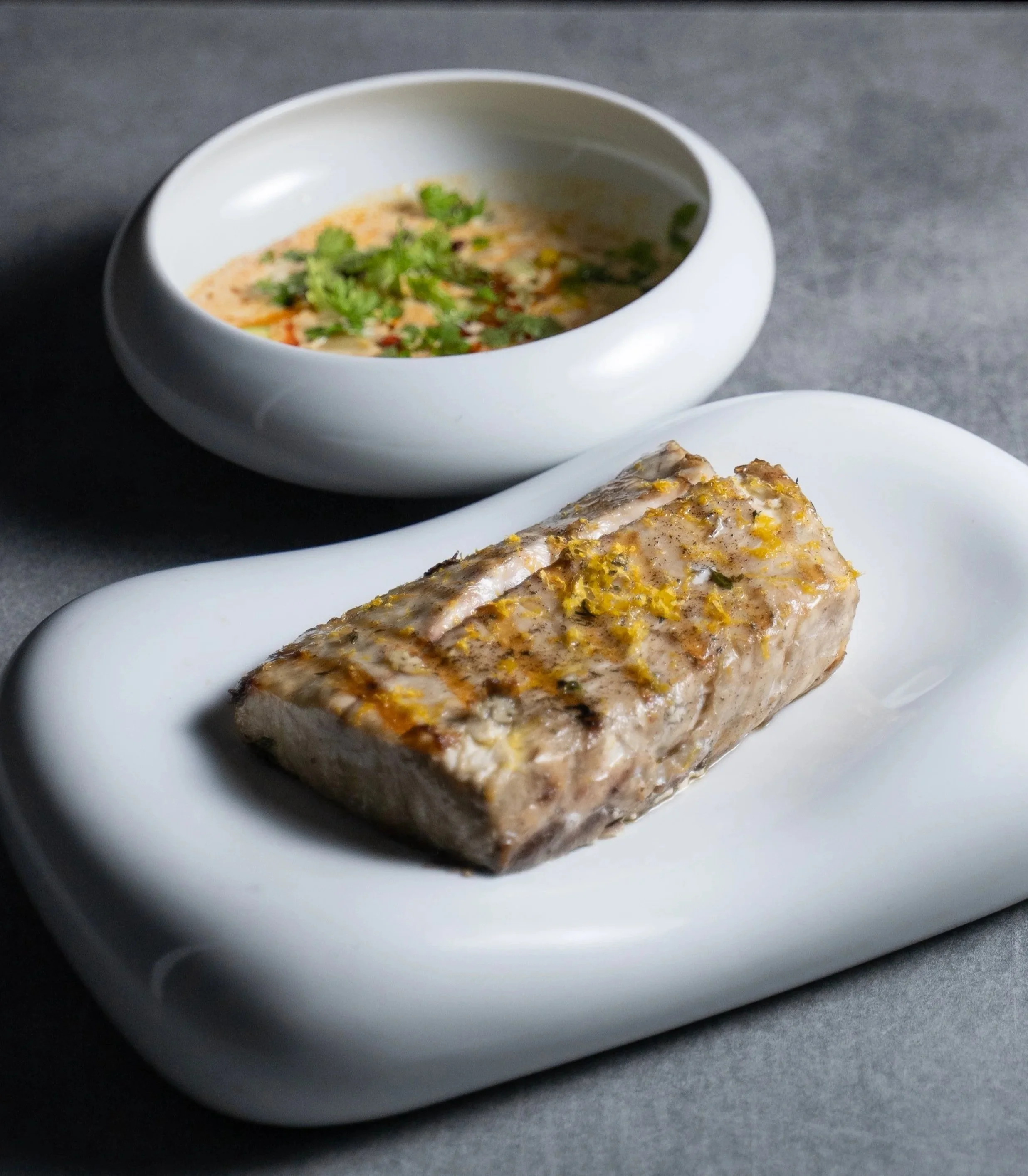 Charcoal grilled dry aged dentex/ Mediterranean cassoulet with summer vegetables, chorizo & smoked butter Charcoal grilled dry aged dentex/ Mediterranean cassoulet with summer vegetables, chorizo & smoked butte