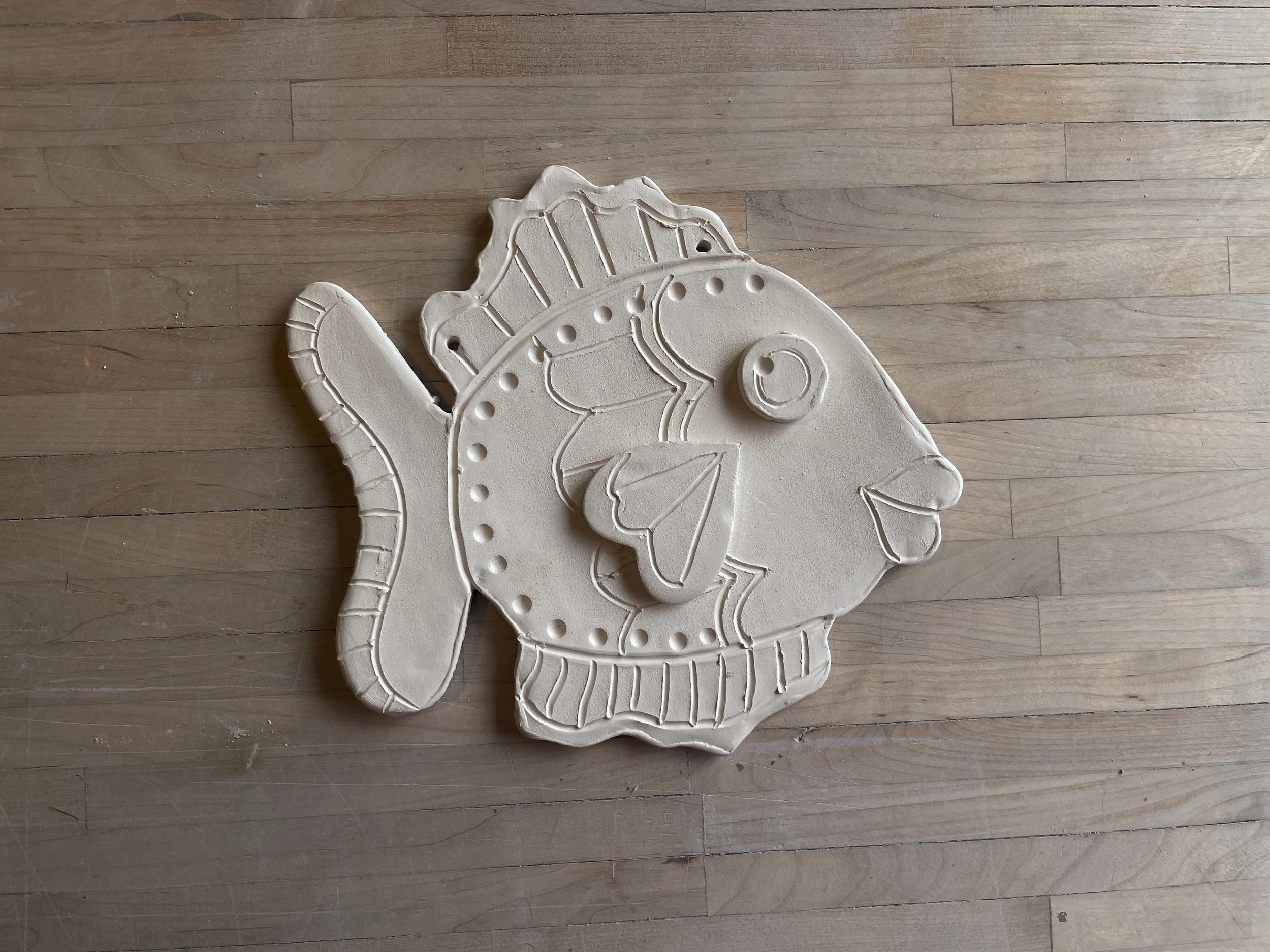 kc clay fish plaque.jpg