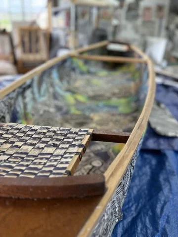 Working on a canoe in the Abiquiu, NM studio showing woven details