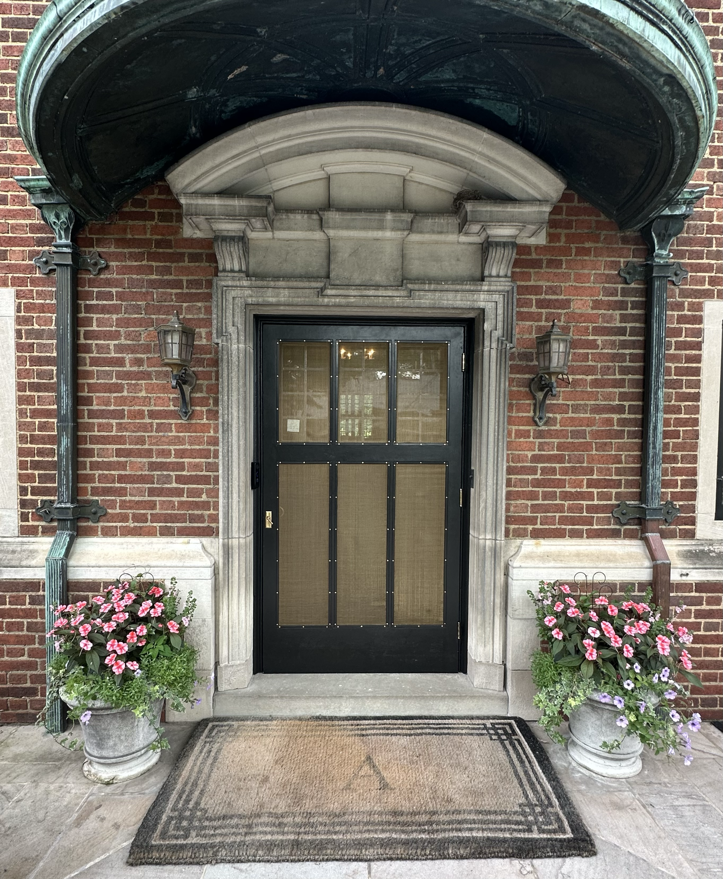 1914 English Revival. Milwaukee. Original storm door restoration. 