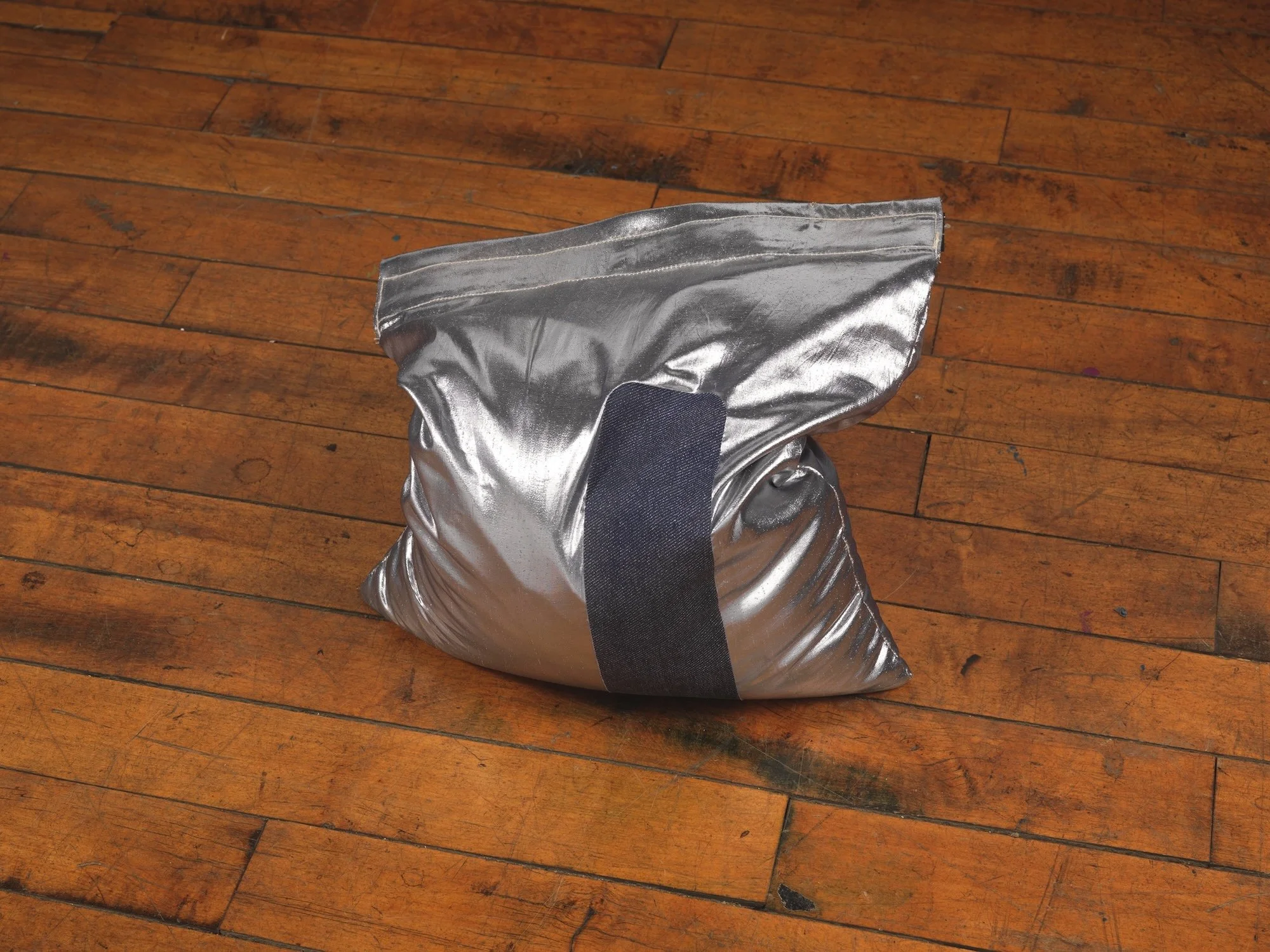 Tomboy, 2006, silver lame, canvas, sand and denim, 11 x 12 x 7 inches