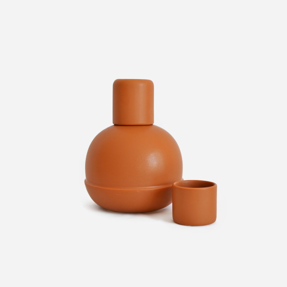 Handmade ceramic colorful carafe and cup. Bold color and shape inspired by  the traditional botellon — La muerte tiene permiso