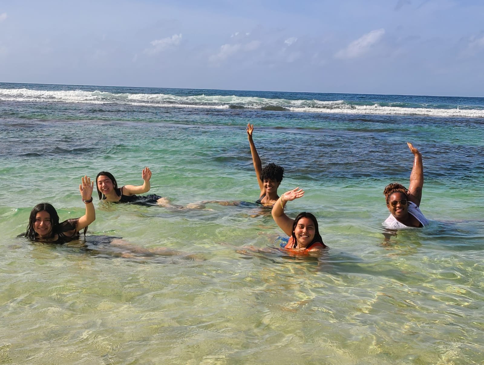 high school students in the ocean on an Offbeat Travel program.jpg