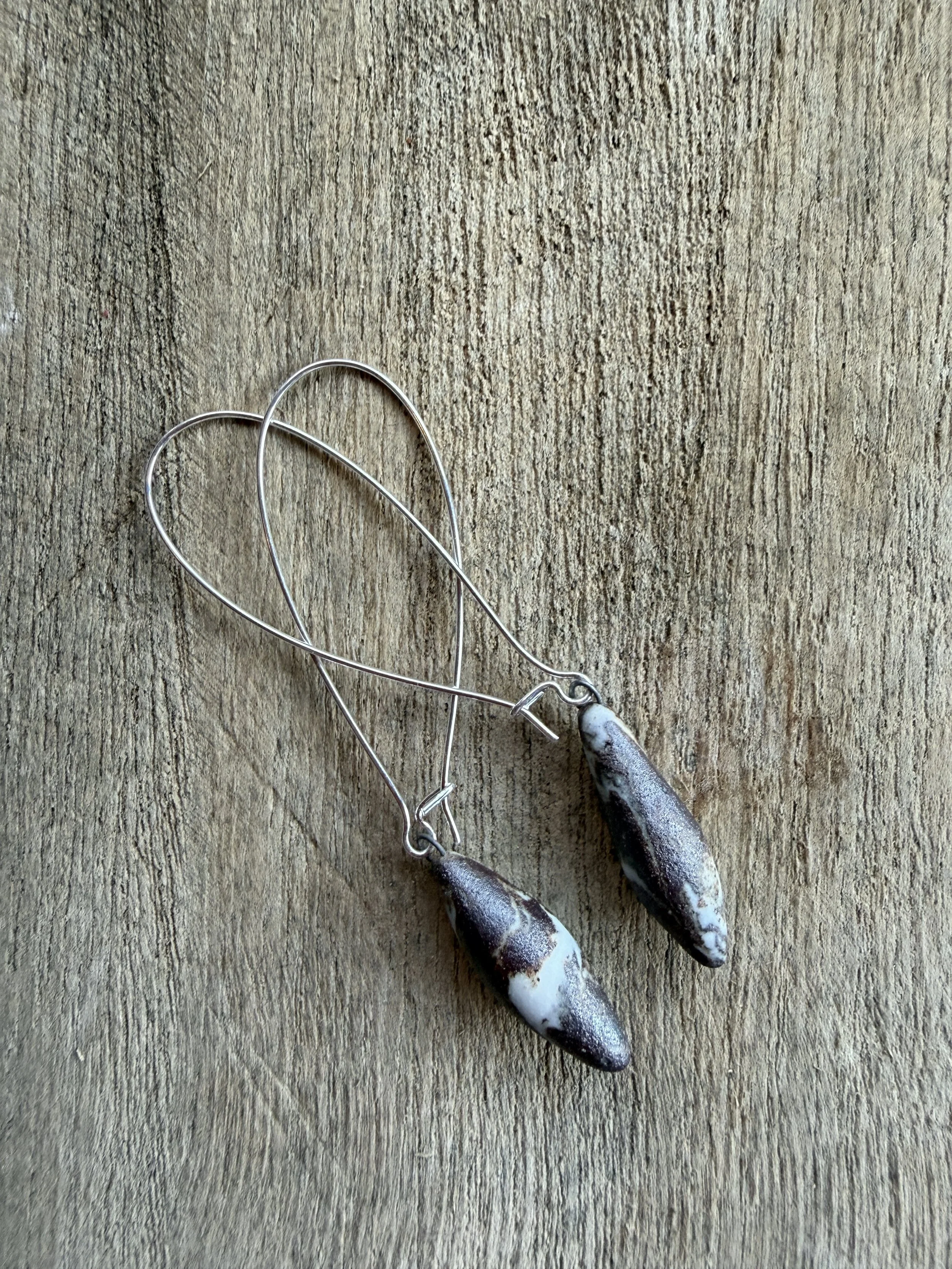 marbled ceramic earrings (spindle-shaped, long drop hoop ear wires)