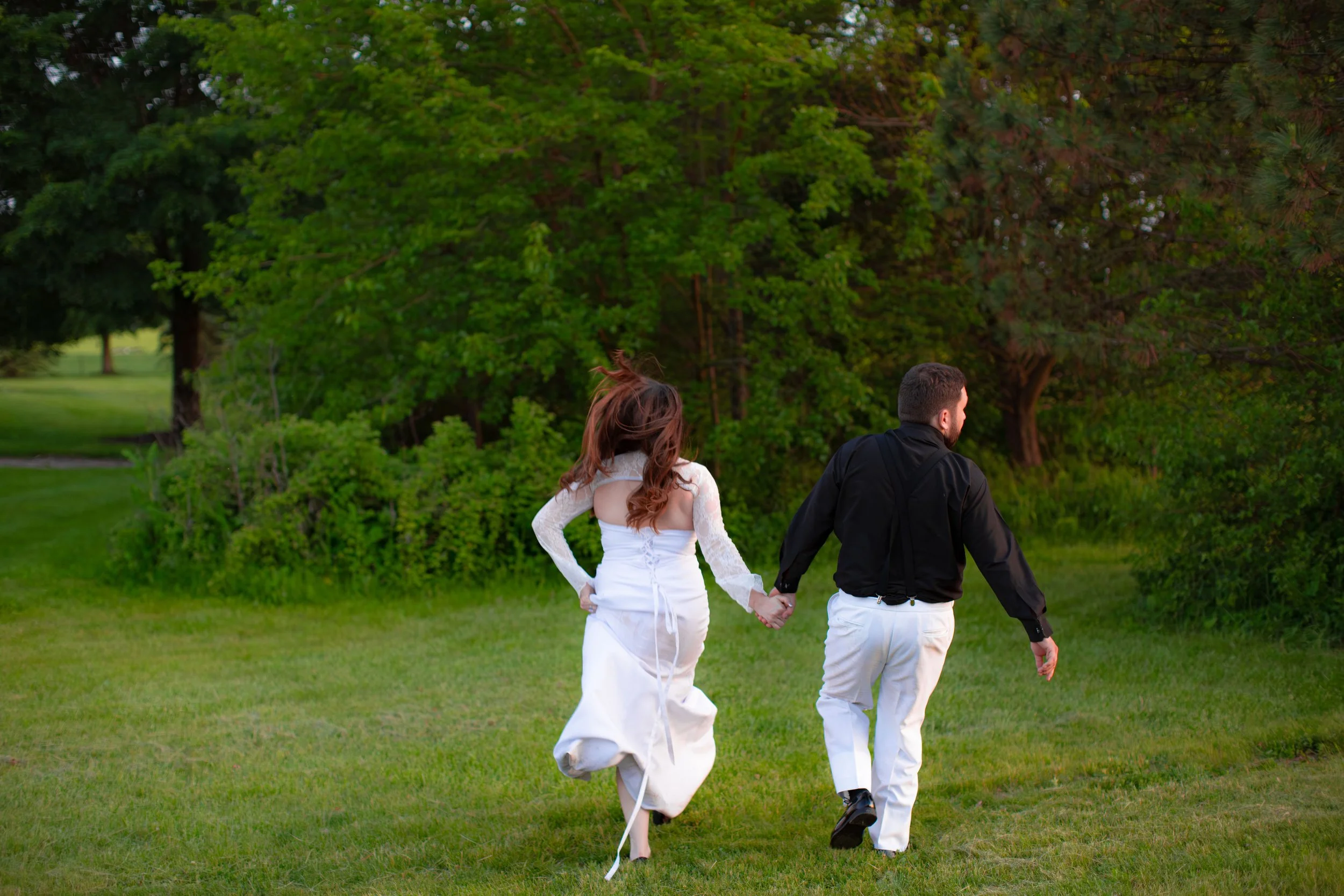 Bride and groom running photo with nature