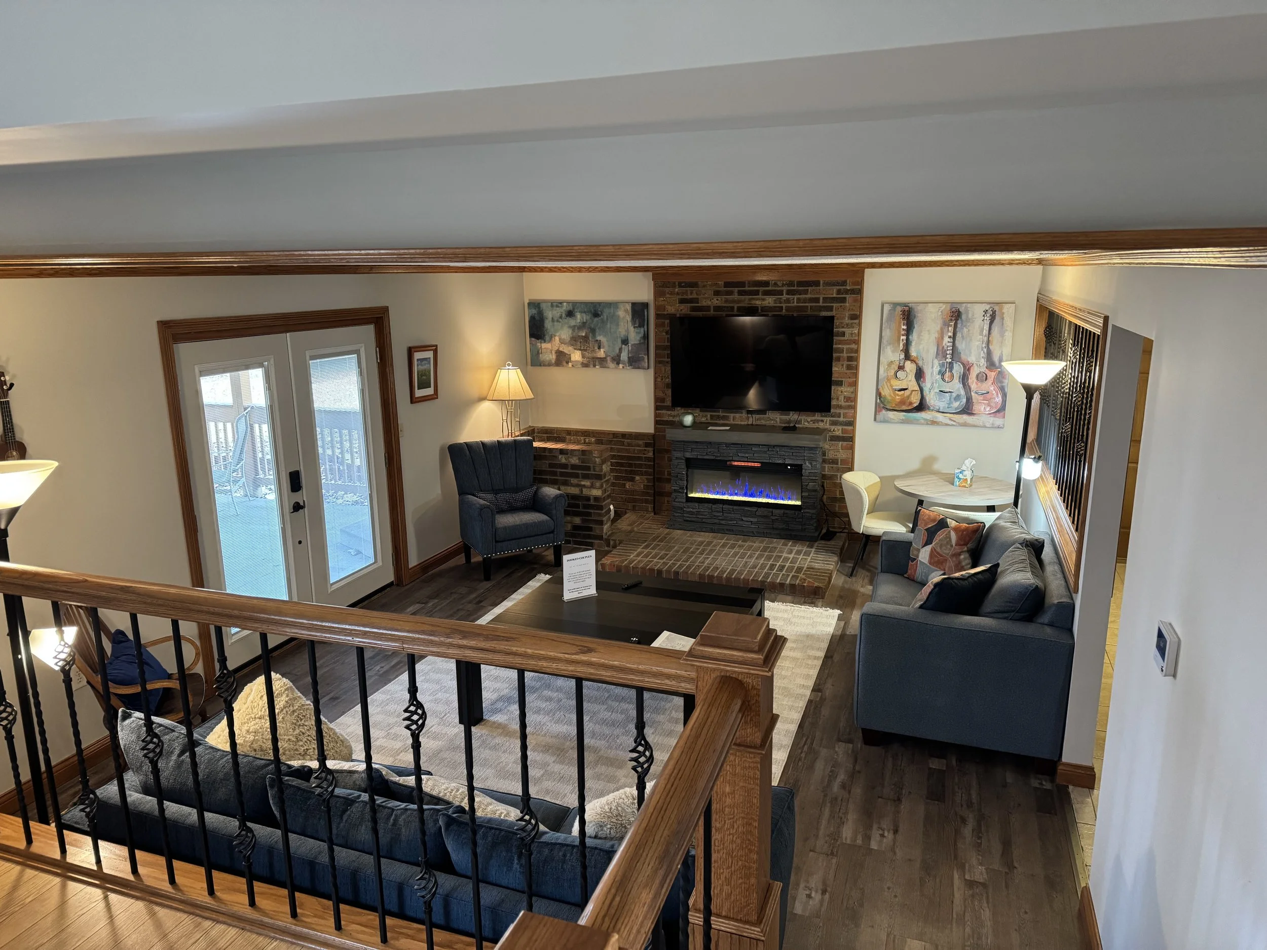 Indoor luxury retreat getaway with brick fireplace