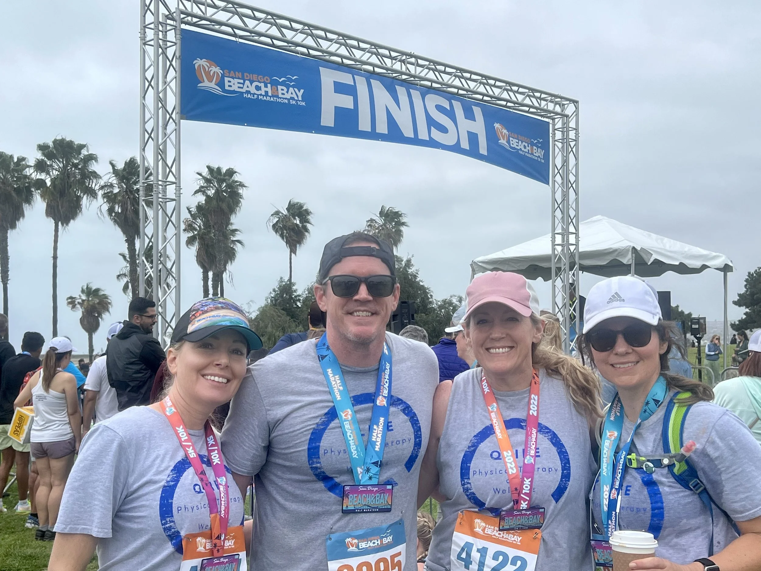 San Diego County runners taking a picture at the finish line