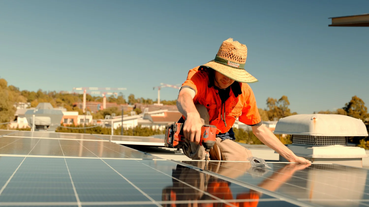 Solar installer on a roof