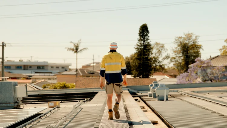 Tradie on a commercial roof