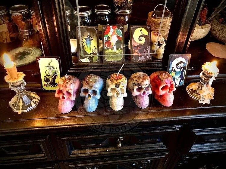 Row of skull candles on the altar
