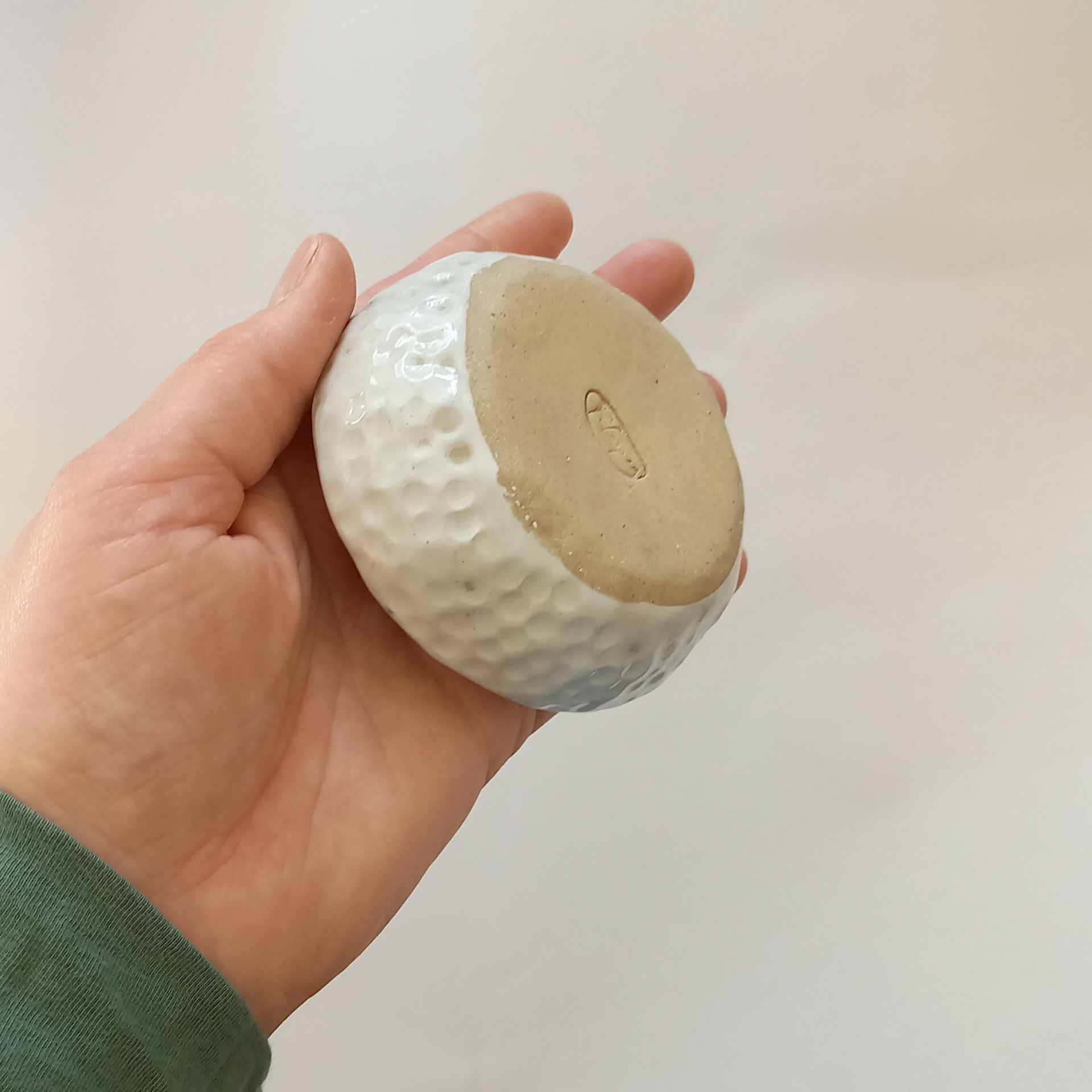 Handmade blue and white ceramic incense holder, back view