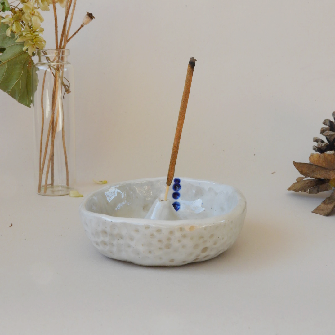 Handmade blue and white ceramic incense holder