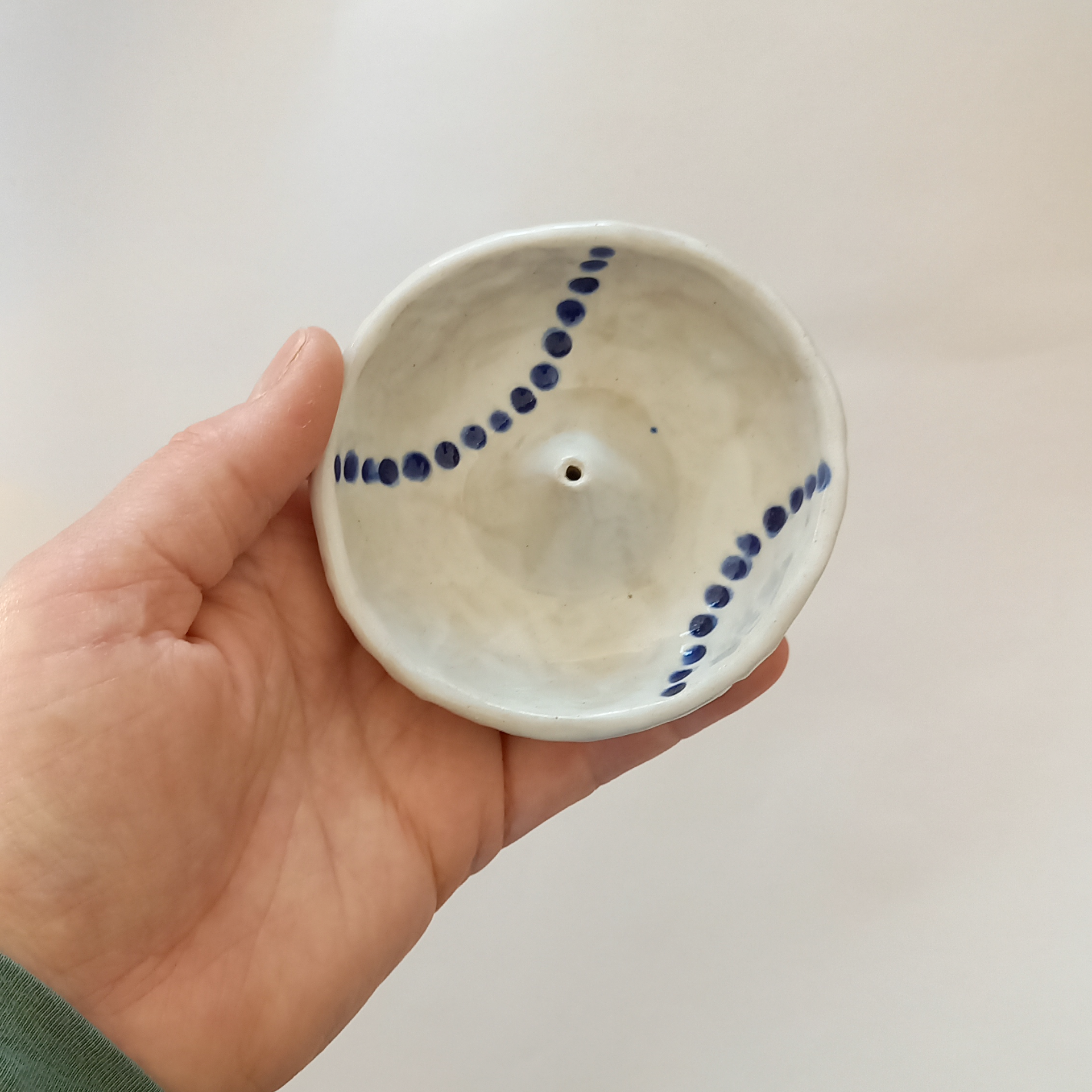 Handmade blue and white ceramic incense holder