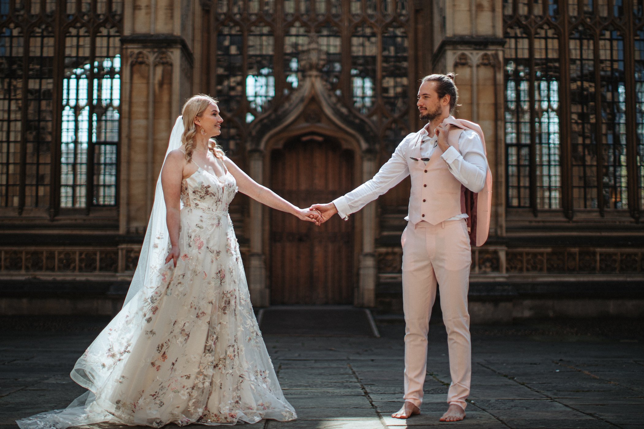 Bodleian Library Wedding bride and groom holding hands