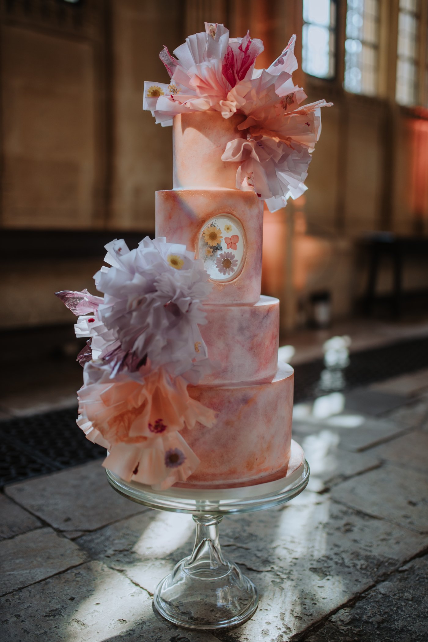 Stunning pastel wedding cake with ruffles