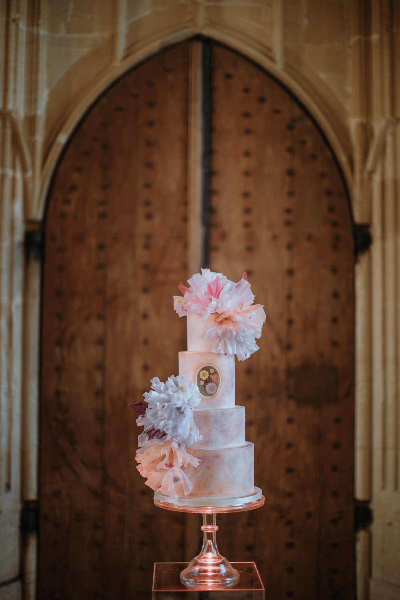 Stunning pastel ruffled wedding cake