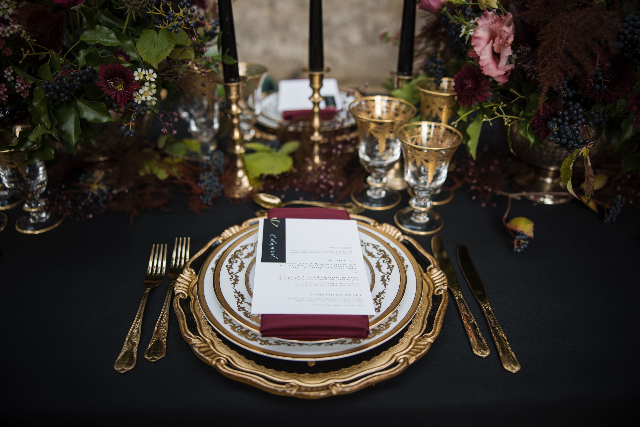 Black and gold table setting at Euridge Manor