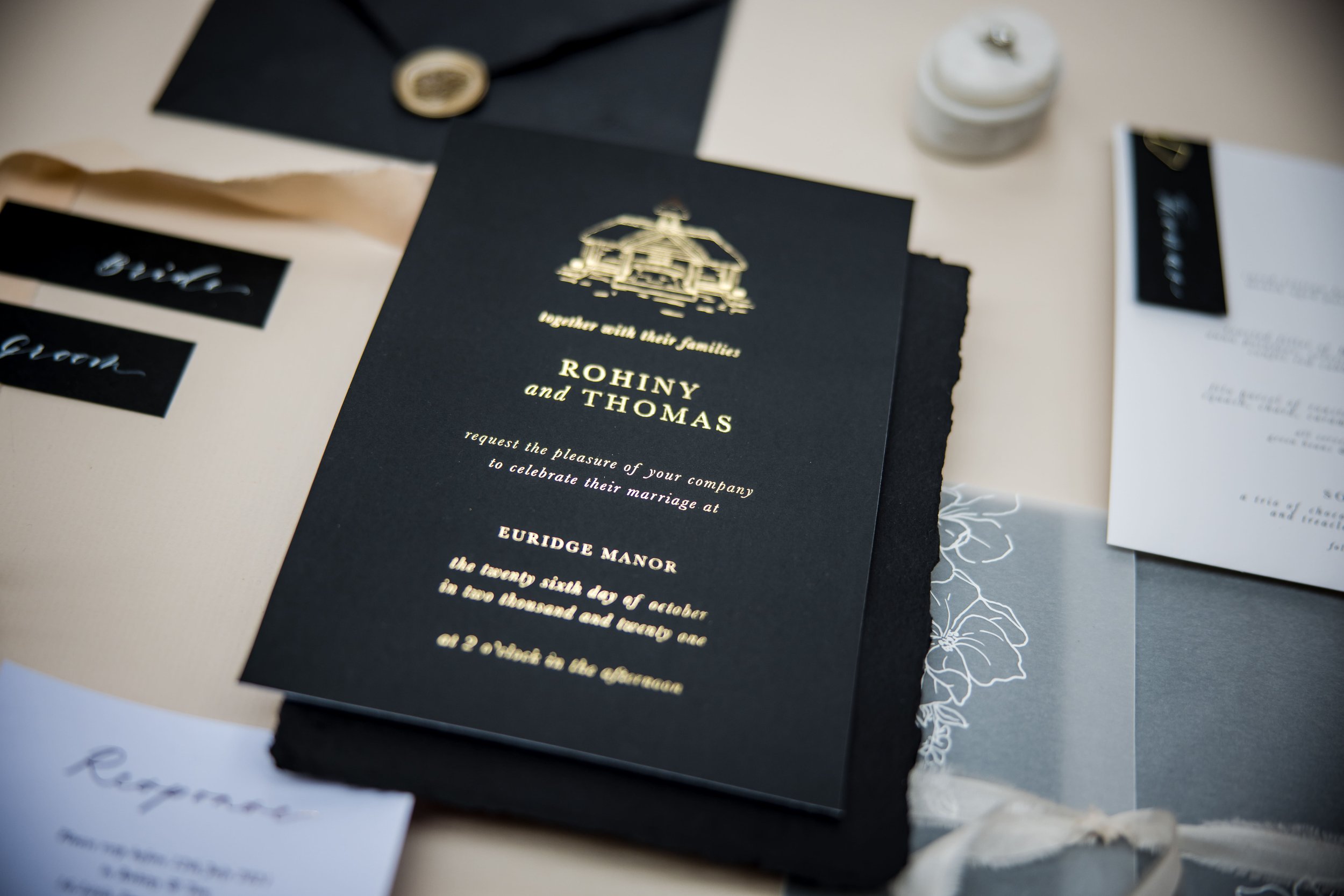 Black and gold wedding stationery