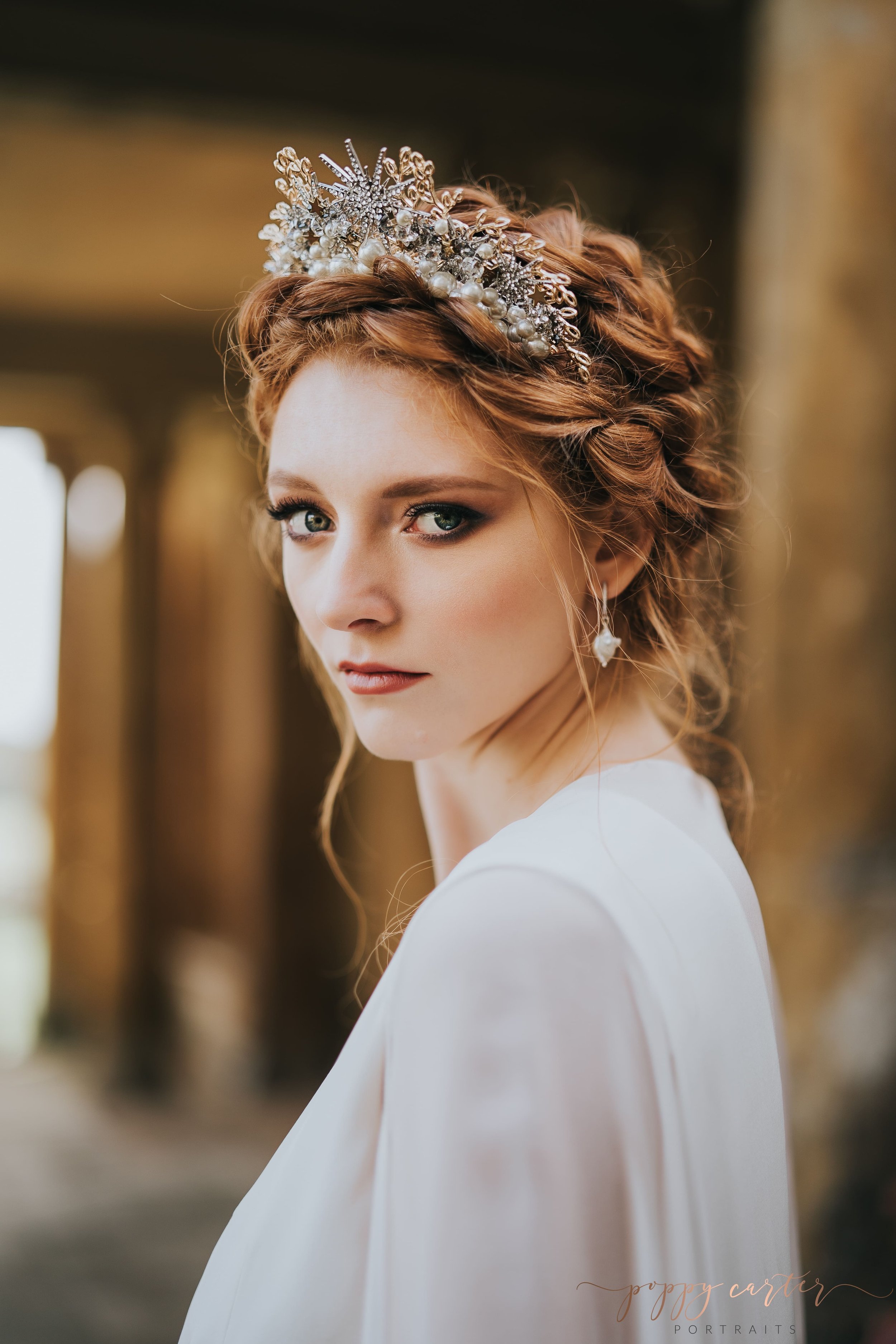Stunning red haired bride in bridal crown