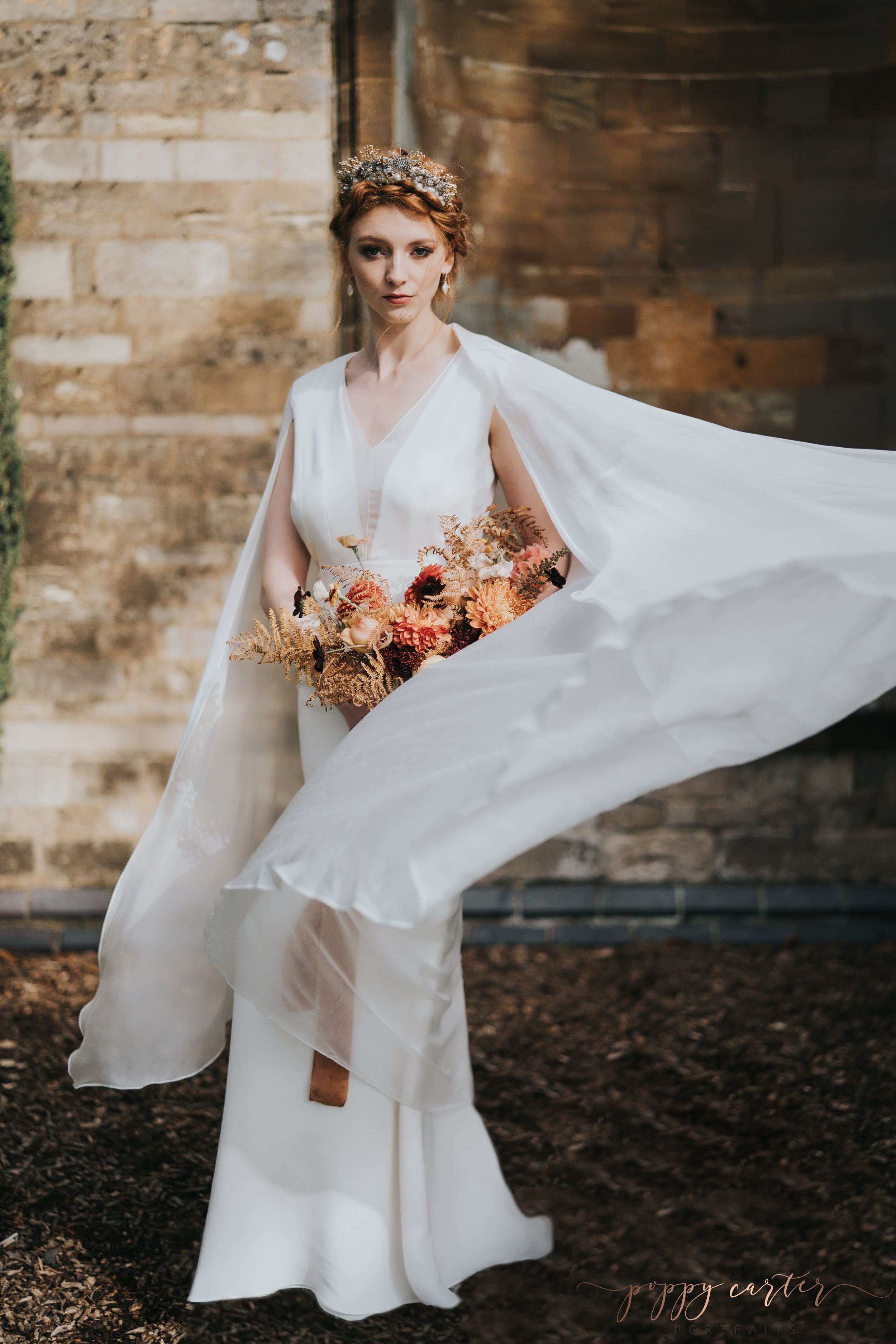 Beautiful autumn bride in swirling dress