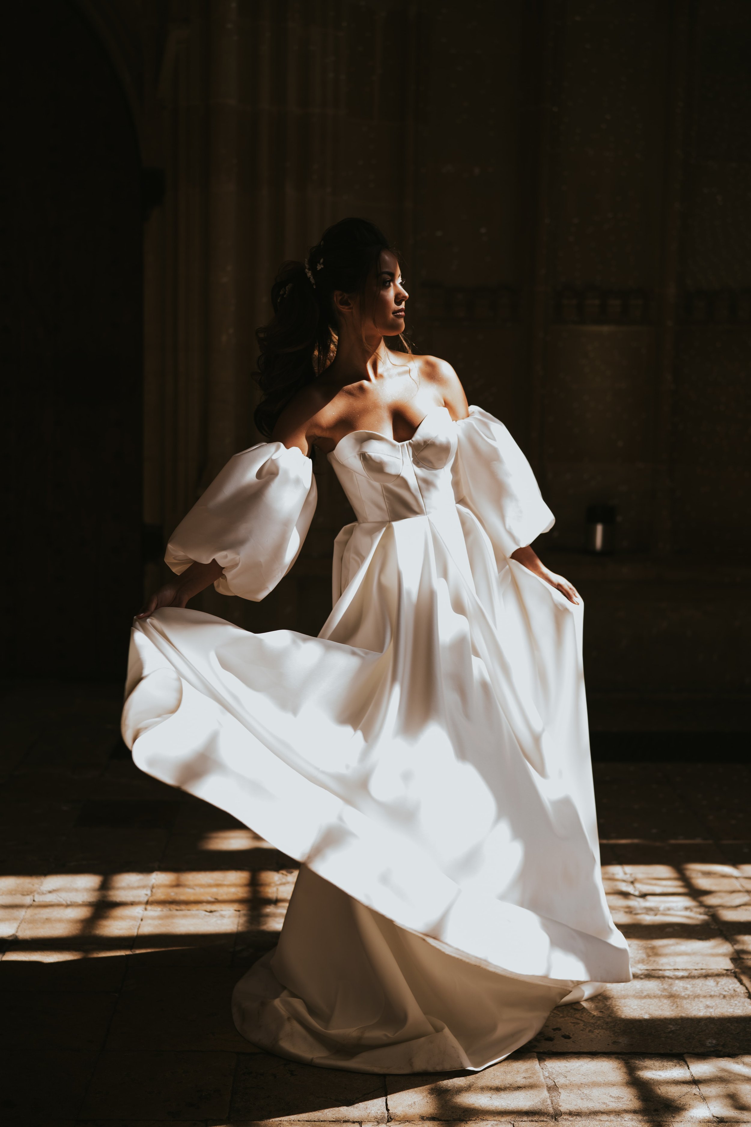 Bride dances in sunlight