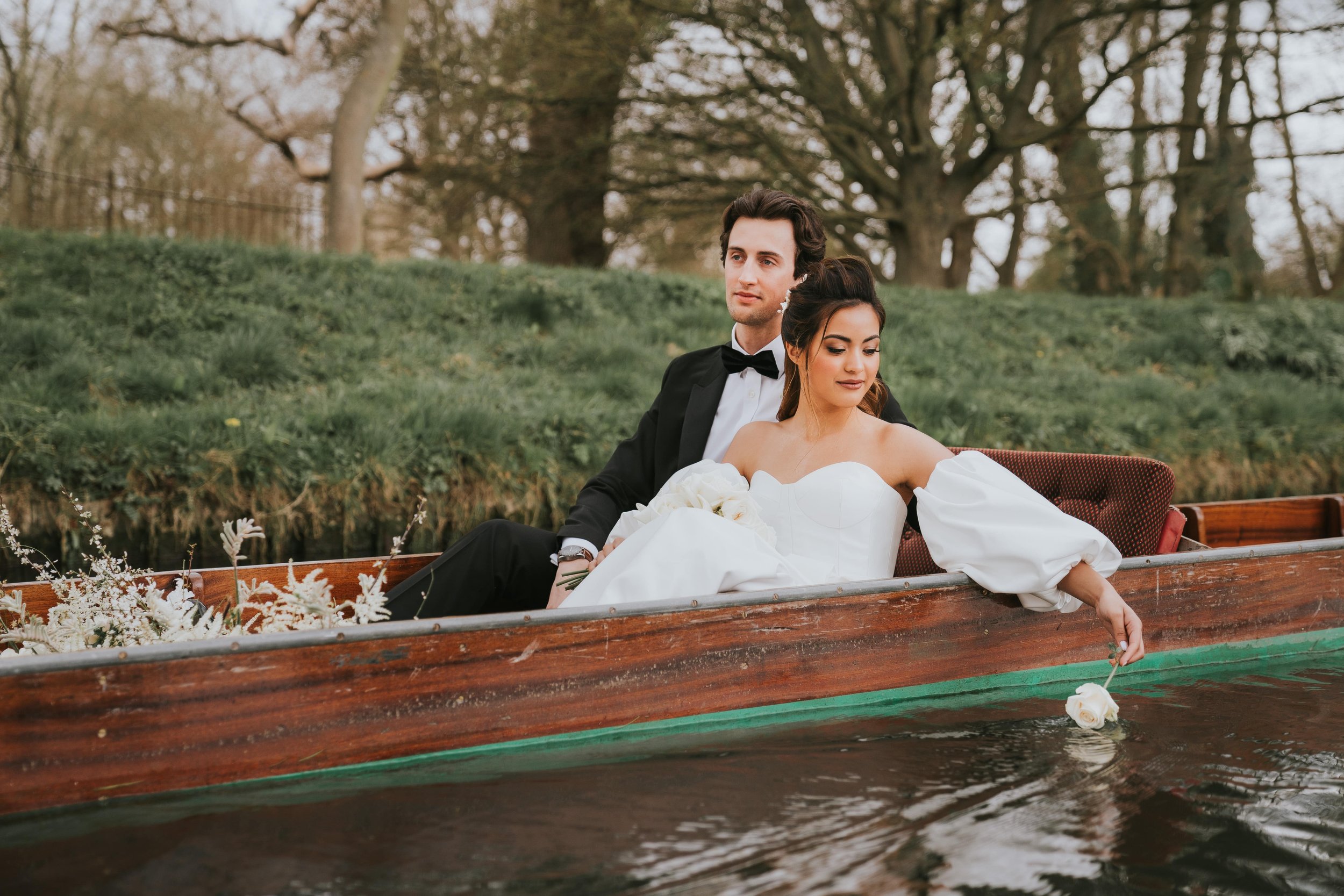 Bride and groom taking a boatride on Thames