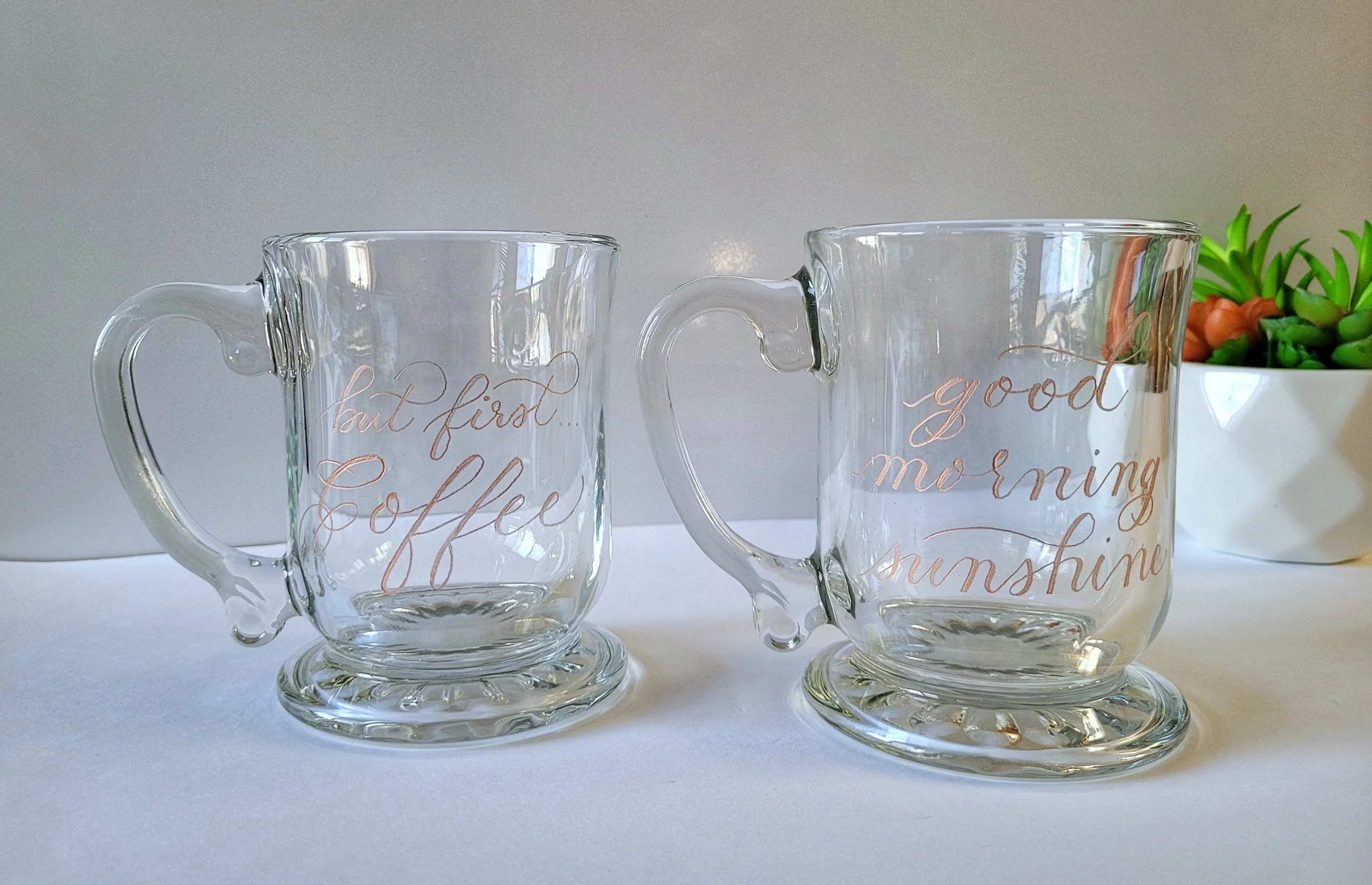 Hand engraved coffee mugs.