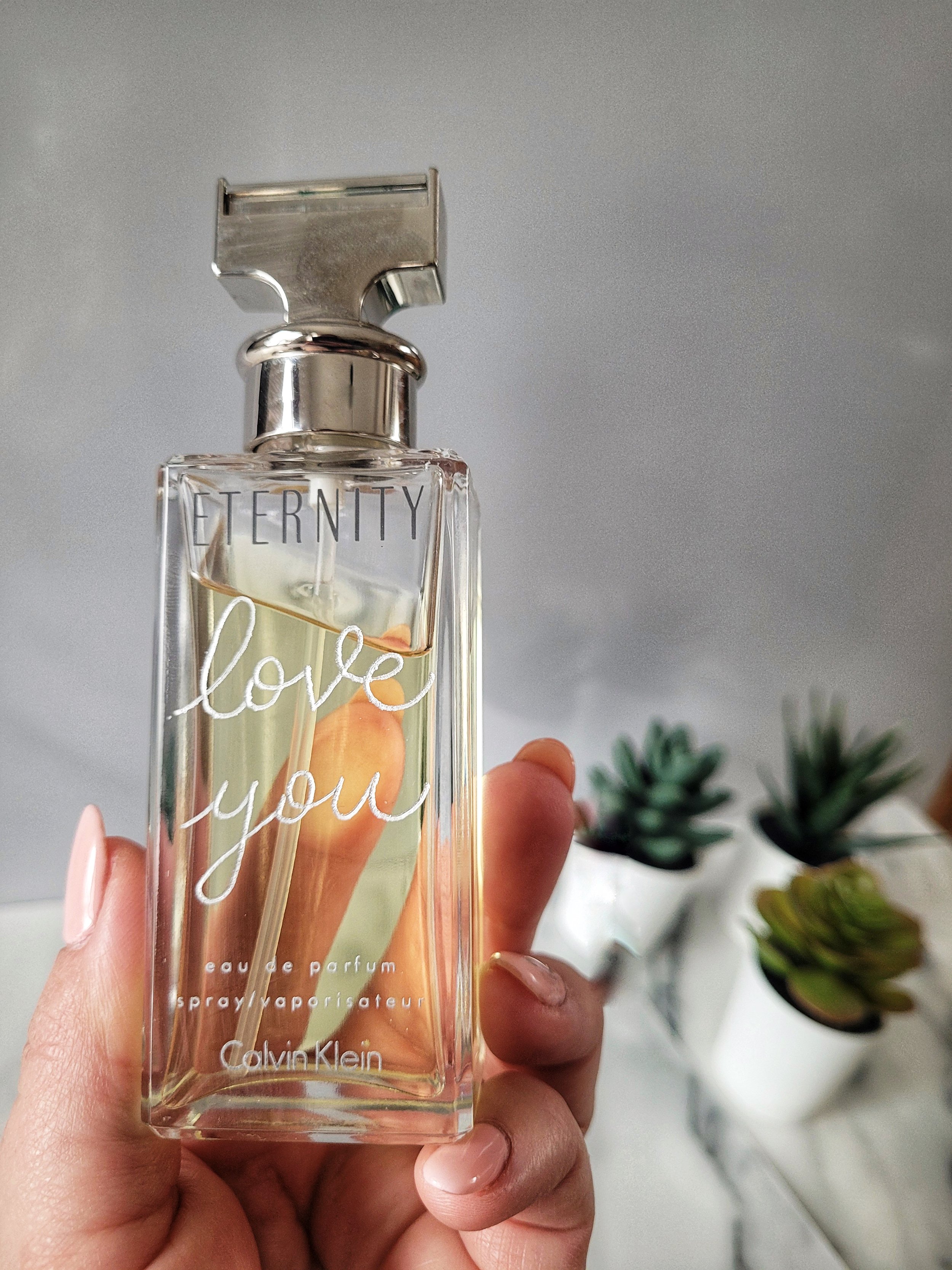 Custom hand engraved perfume bottle.