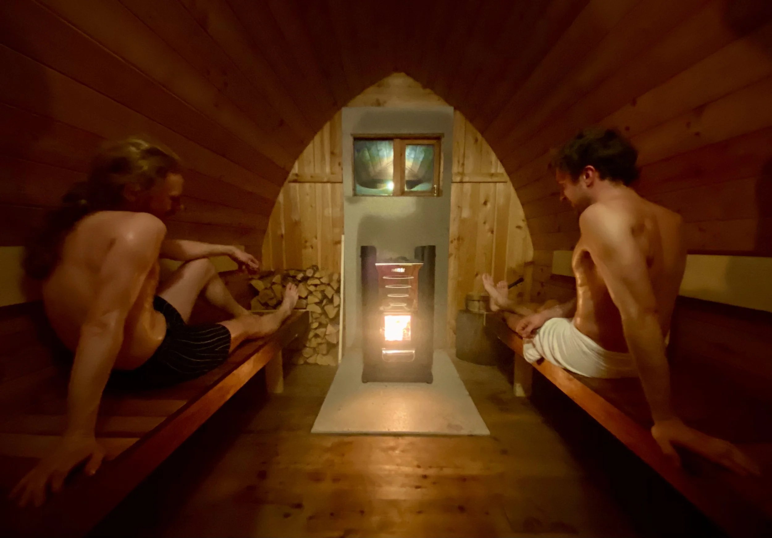 Two persons ejoying the Dragon sauna at Little Siberia