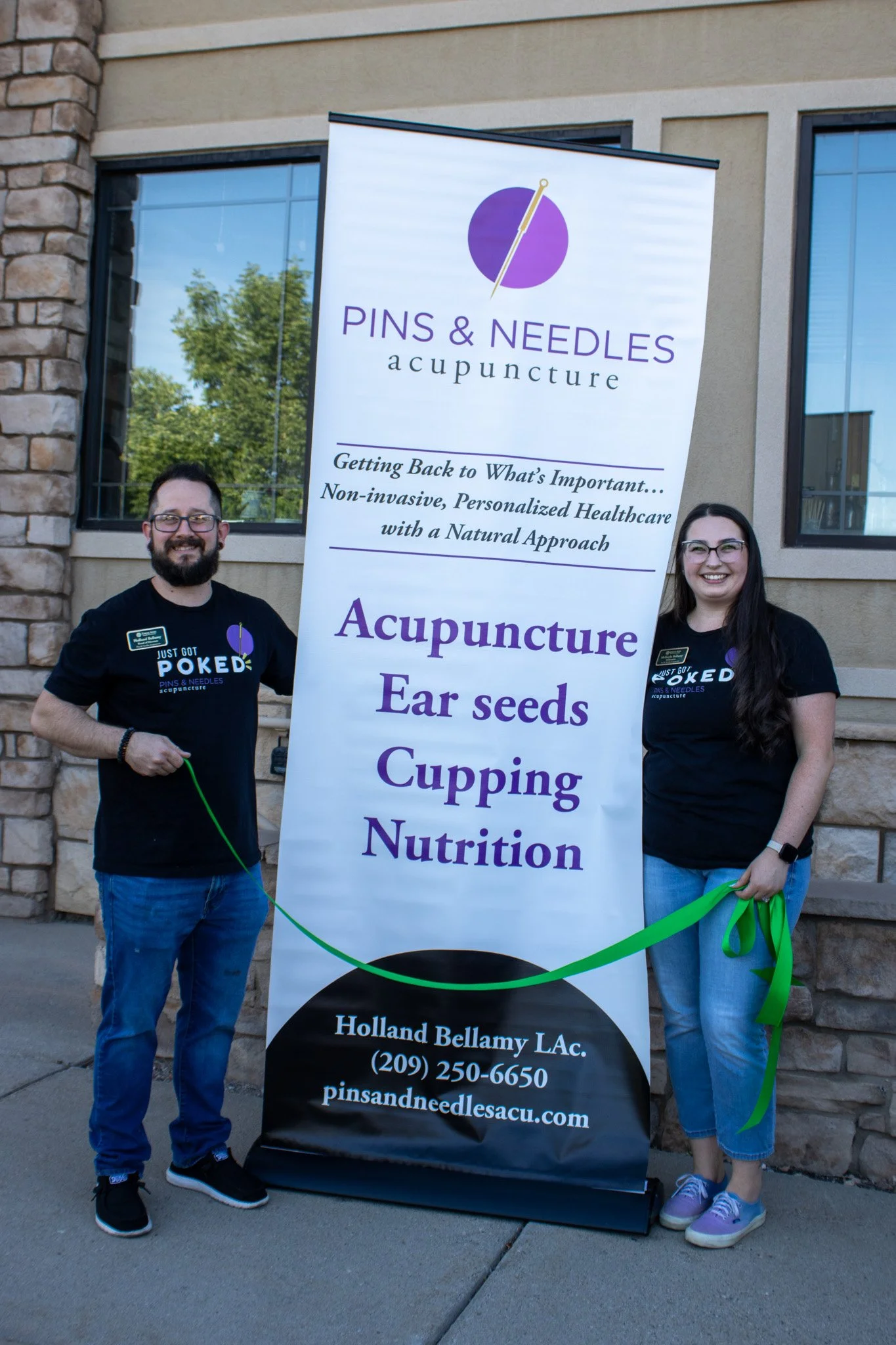 Owners of Pins and Needles Acupuncture at their ribbon cutting for new location
