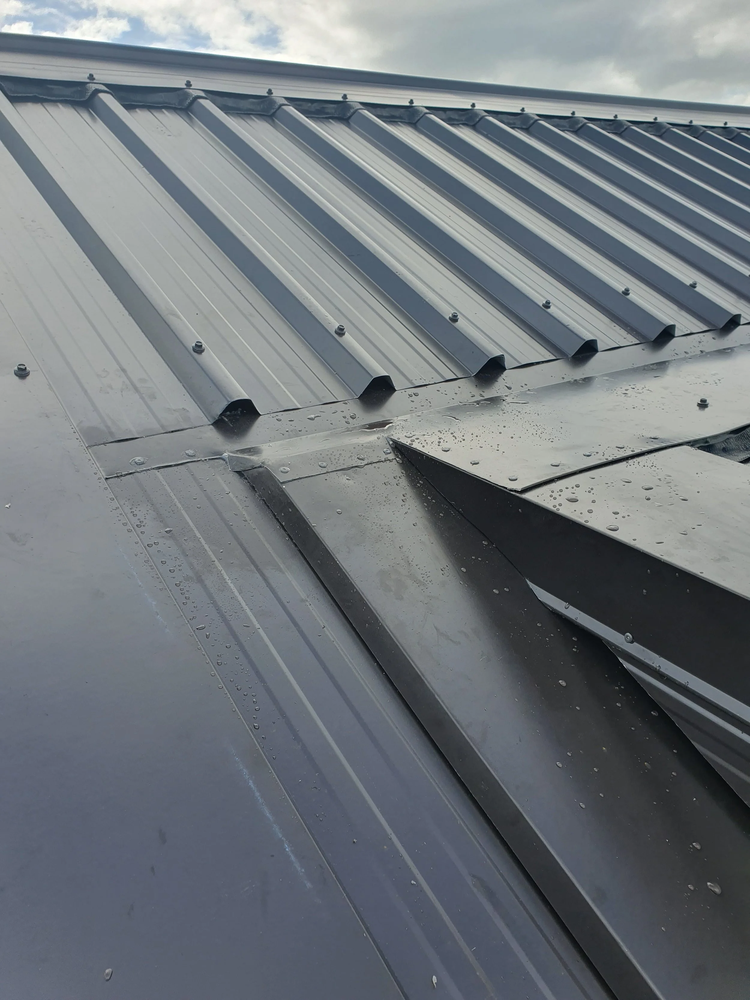 Roof Flashing, change of pitch work.