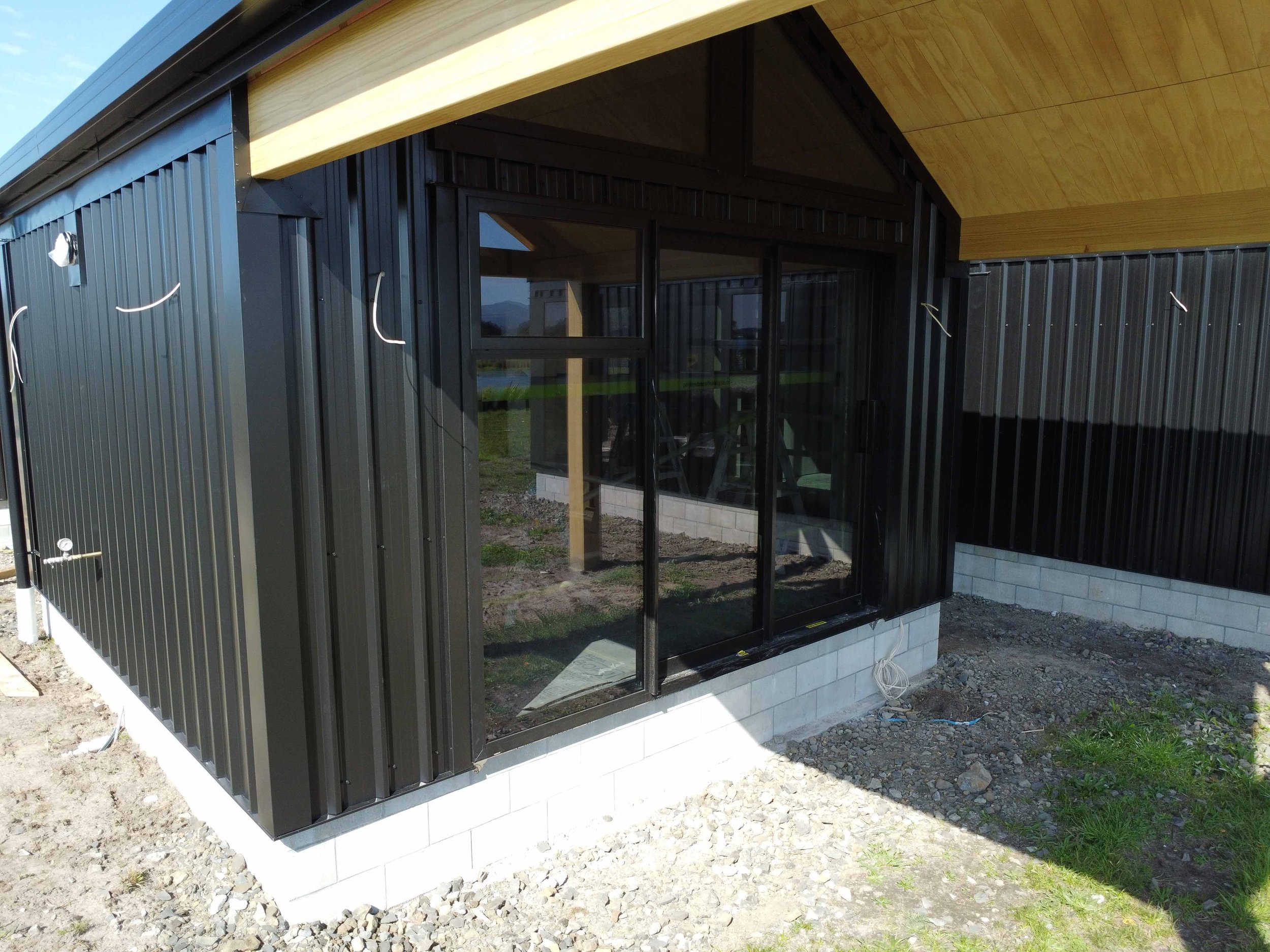 Waikato metal wall cladding steel and tube trimform long run roofing