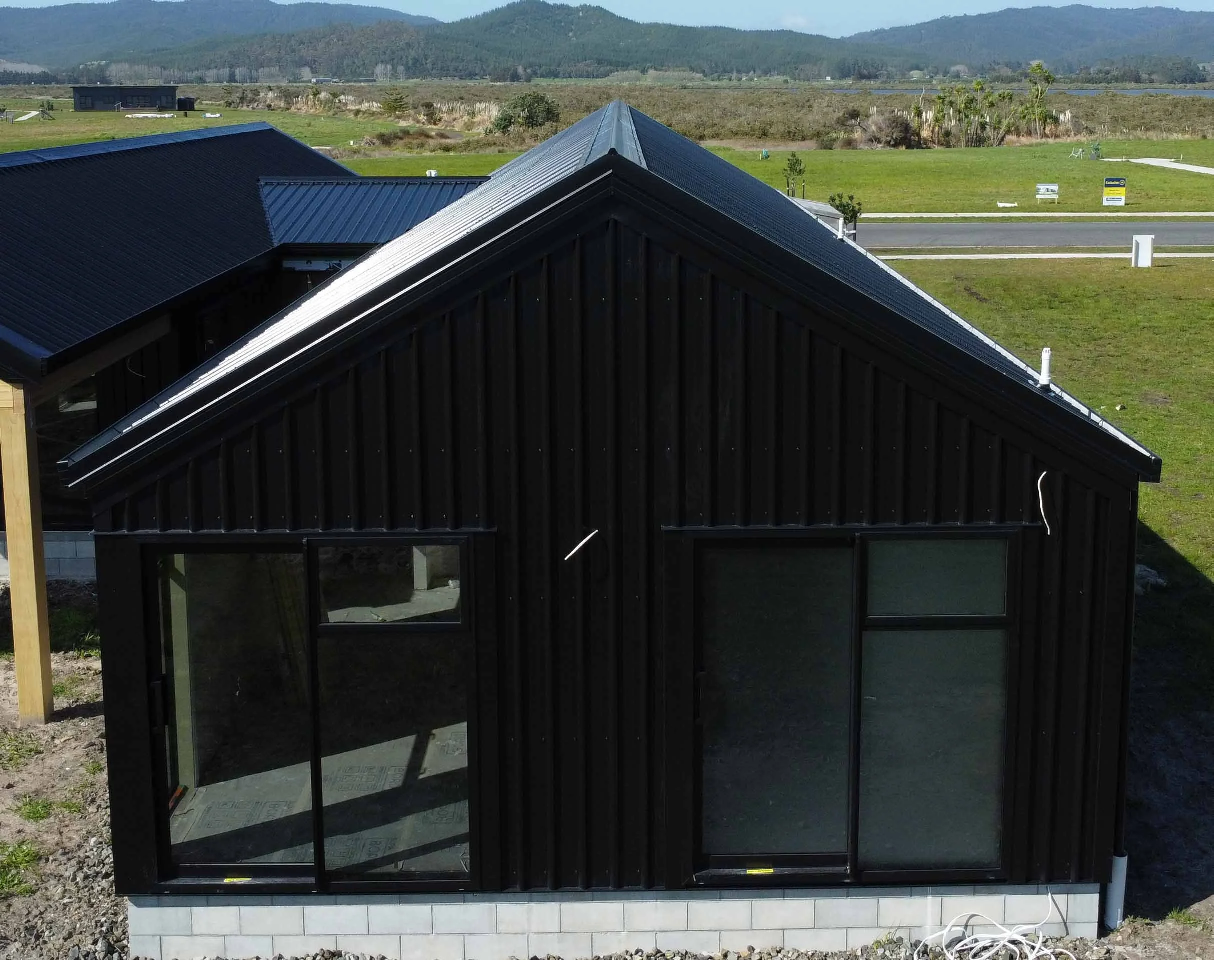Waikato metal wall cladding steel and tube trimform long run roofing