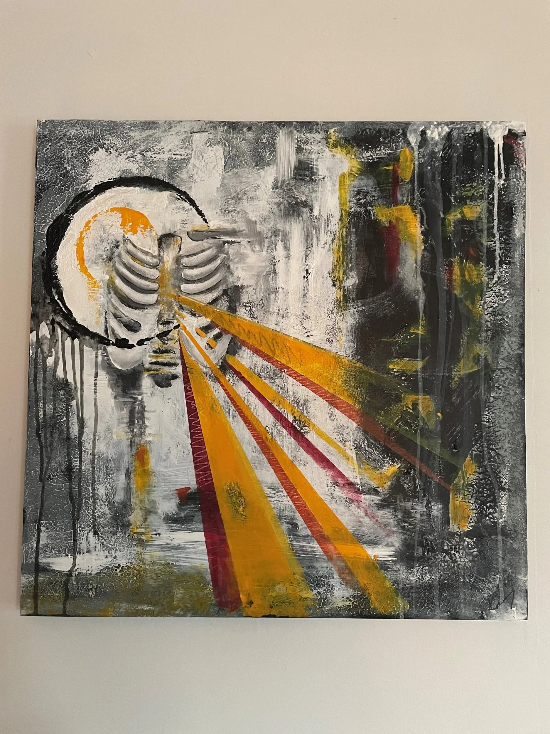 An abstract painting featuring a skeleton wearing a yellow hat on a gray and black background with streaks of red, yellow, and orange.