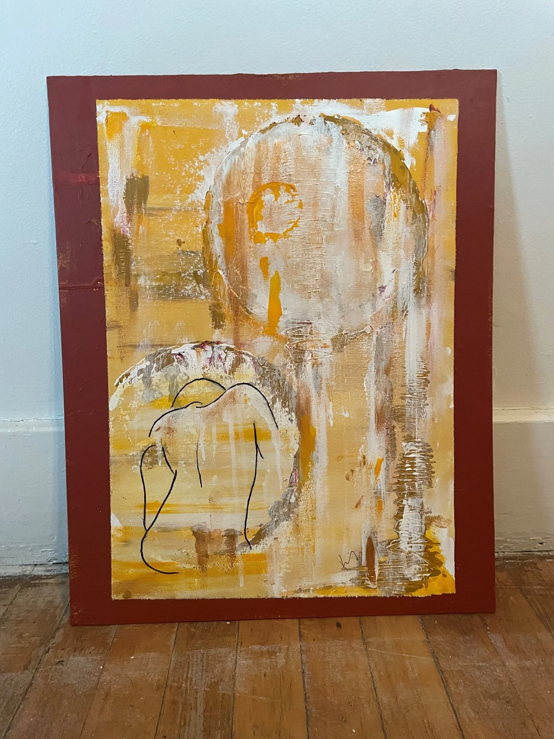 Abstract painting with a simple line drawing of a woman sitting, created with mostly yellow, white, and brown paint, mounted on a red frame.