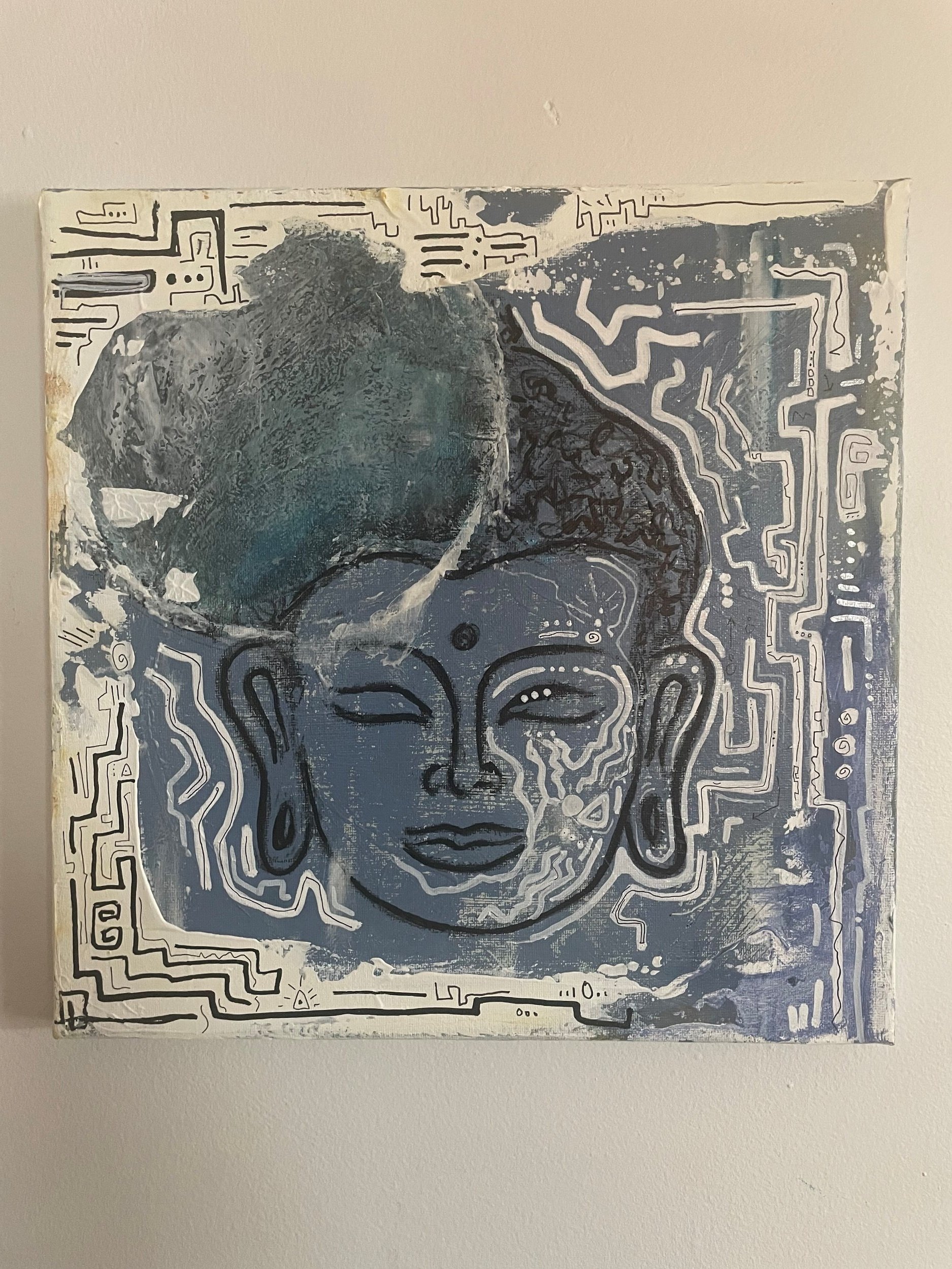 Painting of a woman's face with closed eyes, stylized with line patterns and abstract elements in black, white, and shades of blue.