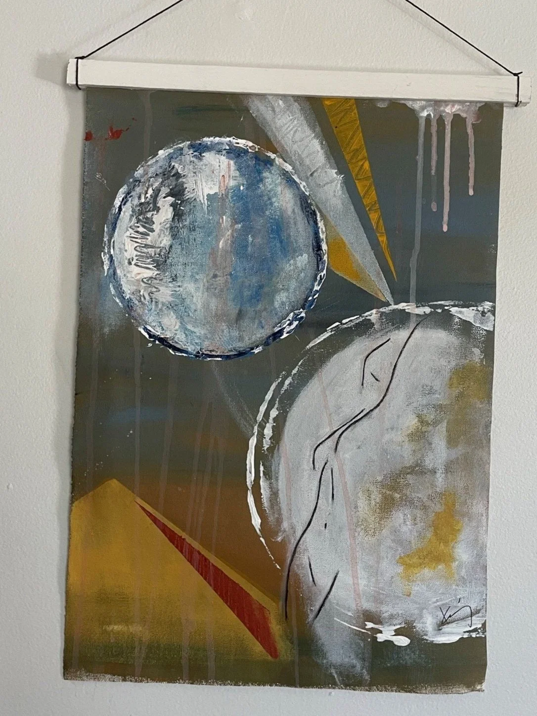 Abstract painting with geometric shapes, planets, and lines in shades of blue, white, yellow, and brown.