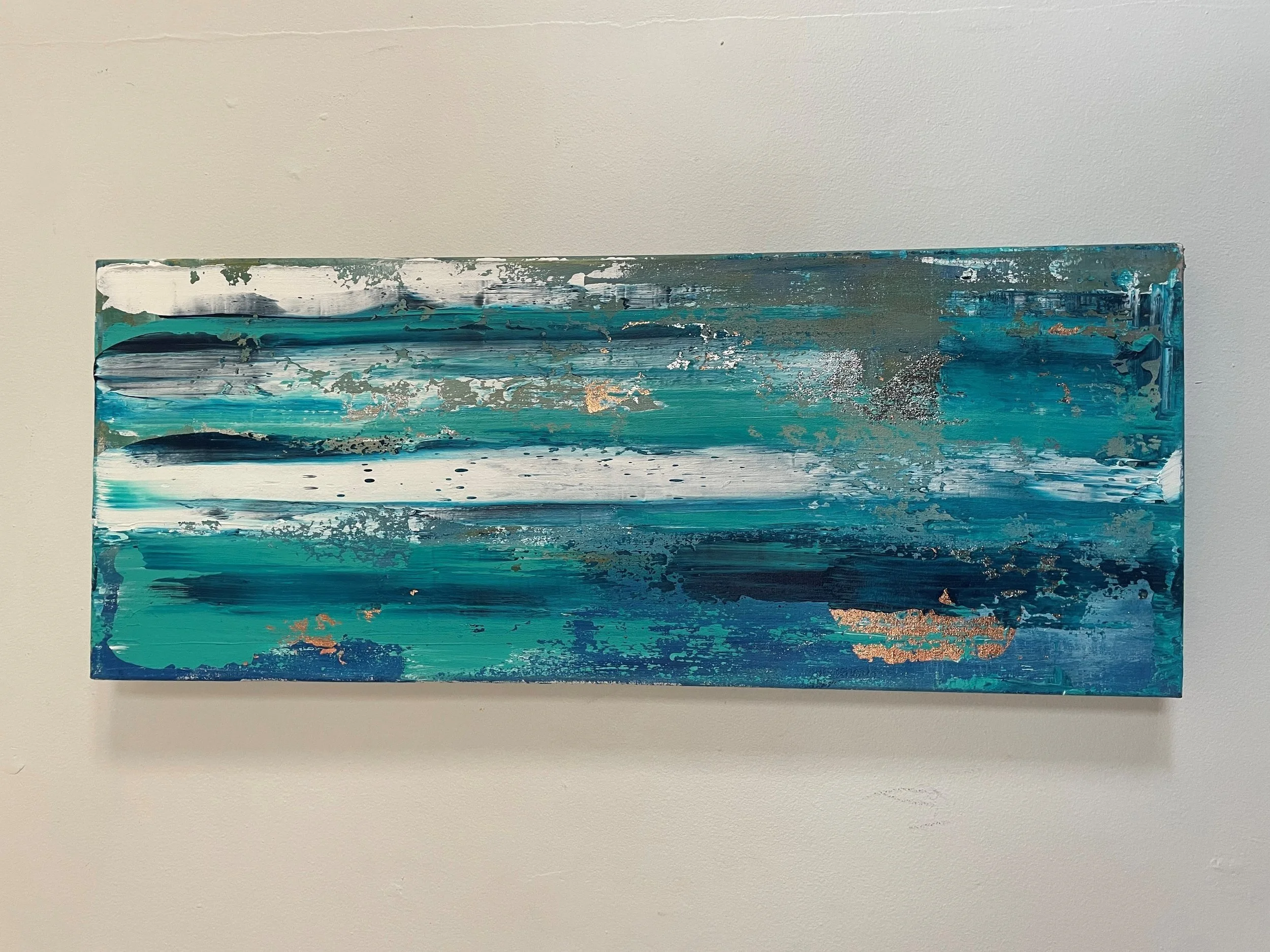 Abstract painting with blue, black, white, and metallic silver colors on a rectangular canvas.