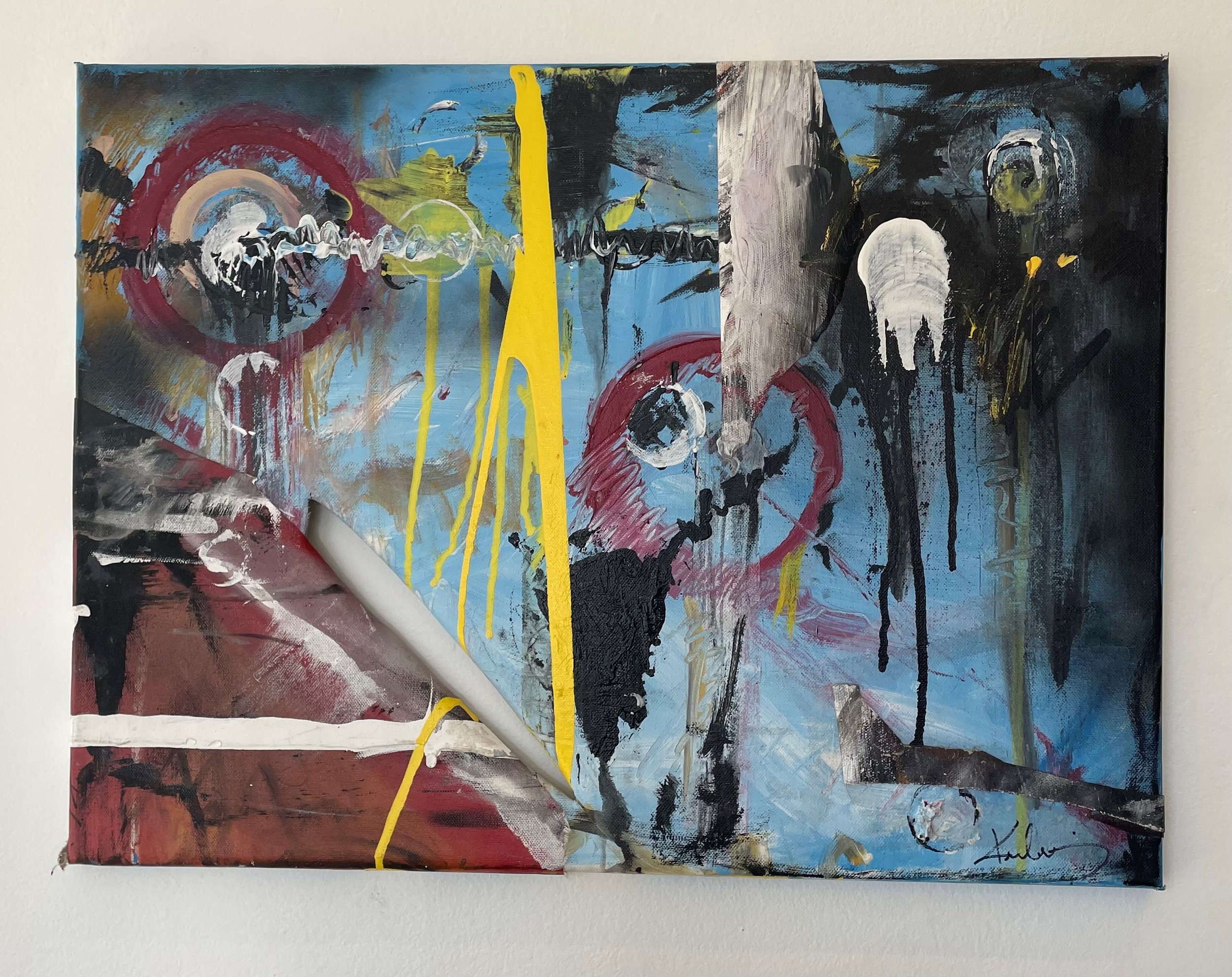 Abstract colorful painting with black, blue, red, yellow, and white strokes and splatters, featuring circular and linear patterns.