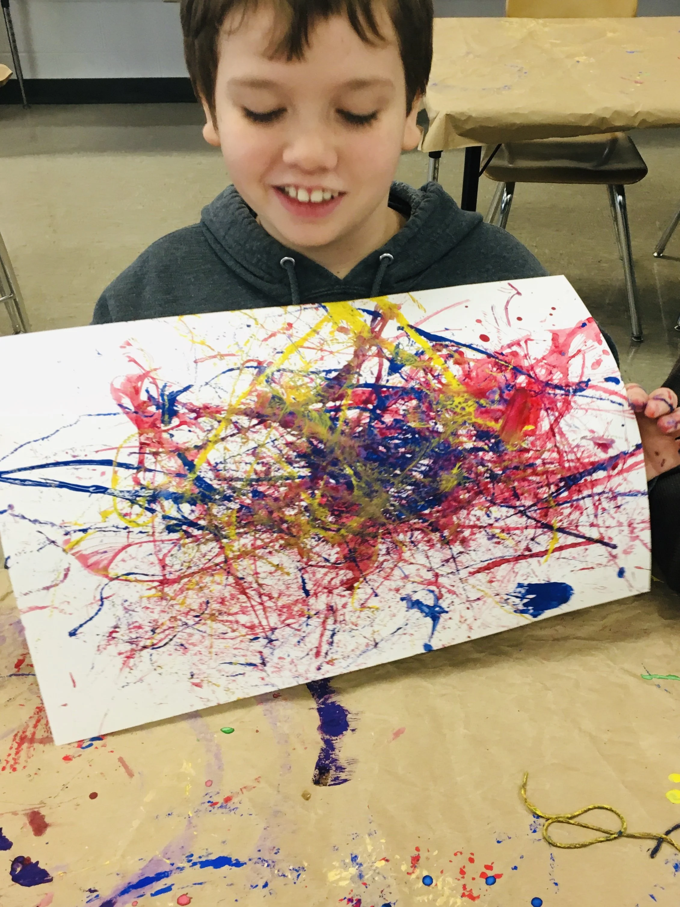 Jackson Pollock project, string art with tempera paint.