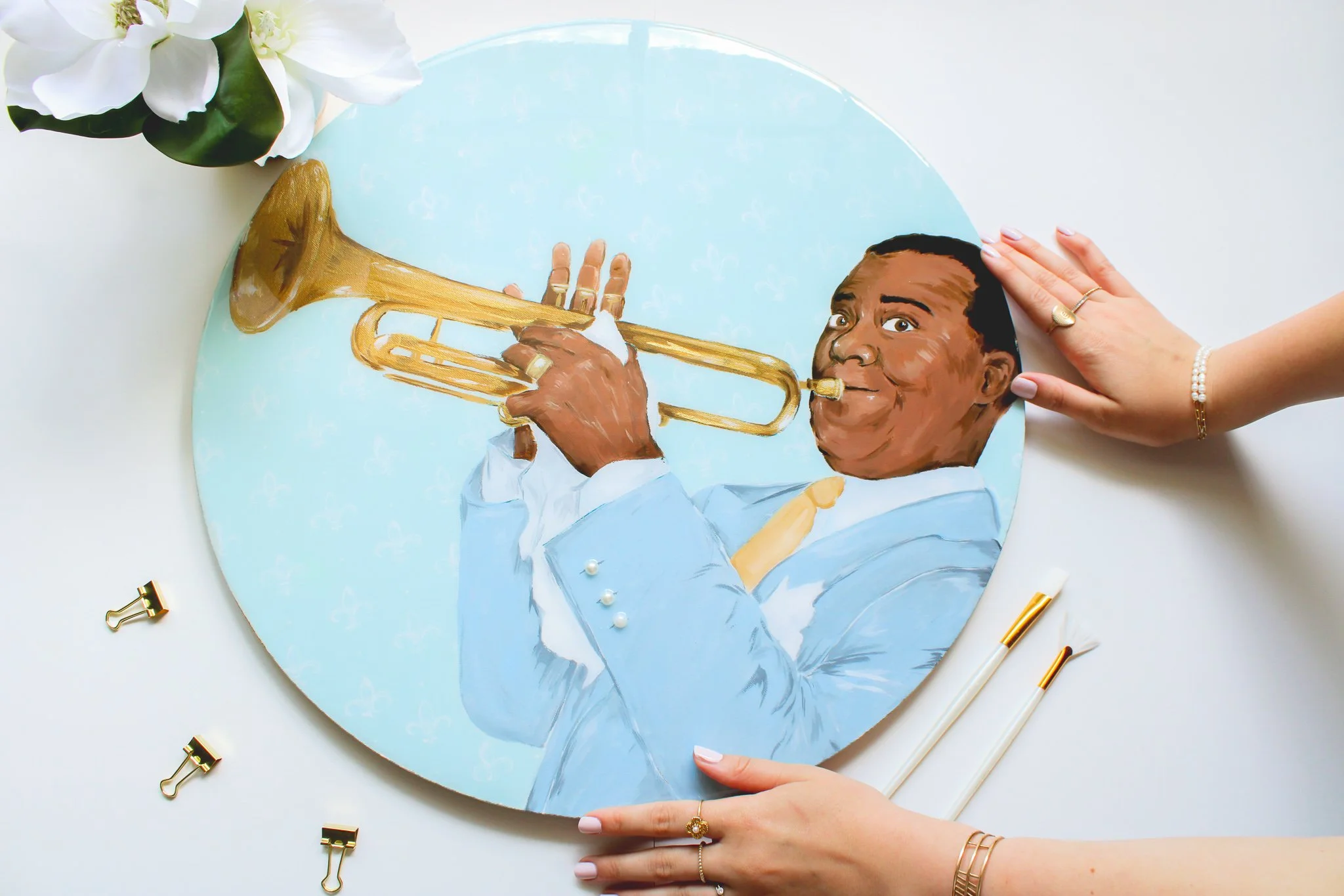singer louis armstrong with a gold horn custom artwork of the musician. 