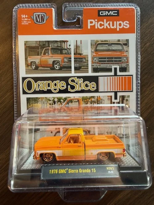 CHASE - M2 Machines 1:64 1976 GMC Sierra Grande “Orange Slice” – Hobby Exclusive