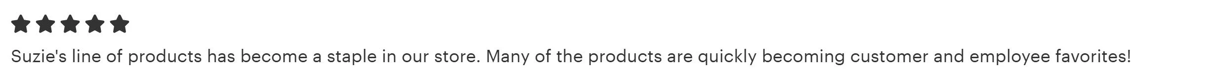 Customer review with five stars and a positive comment about Suzie's products becoming popular in the store.